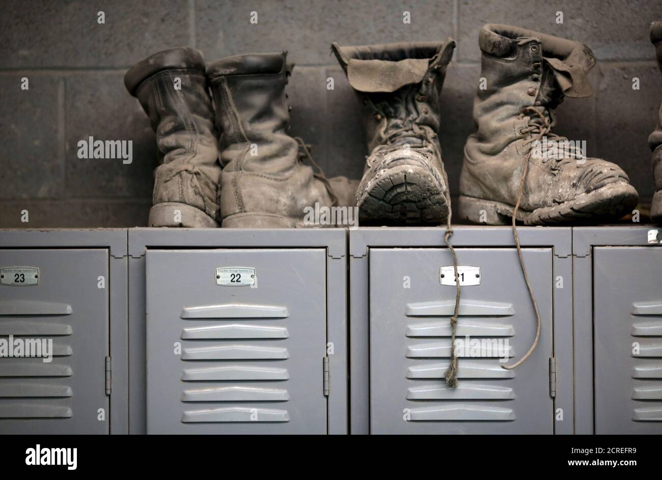 Coal mining boots are shown above miners' lockers before the start of an  afternoon shift at a coal mine near Gilbert, West Virginia May 22, 2014.  REUTERS/Robert Galbraith/File Photo GLOBAL BUSINESS WEEK