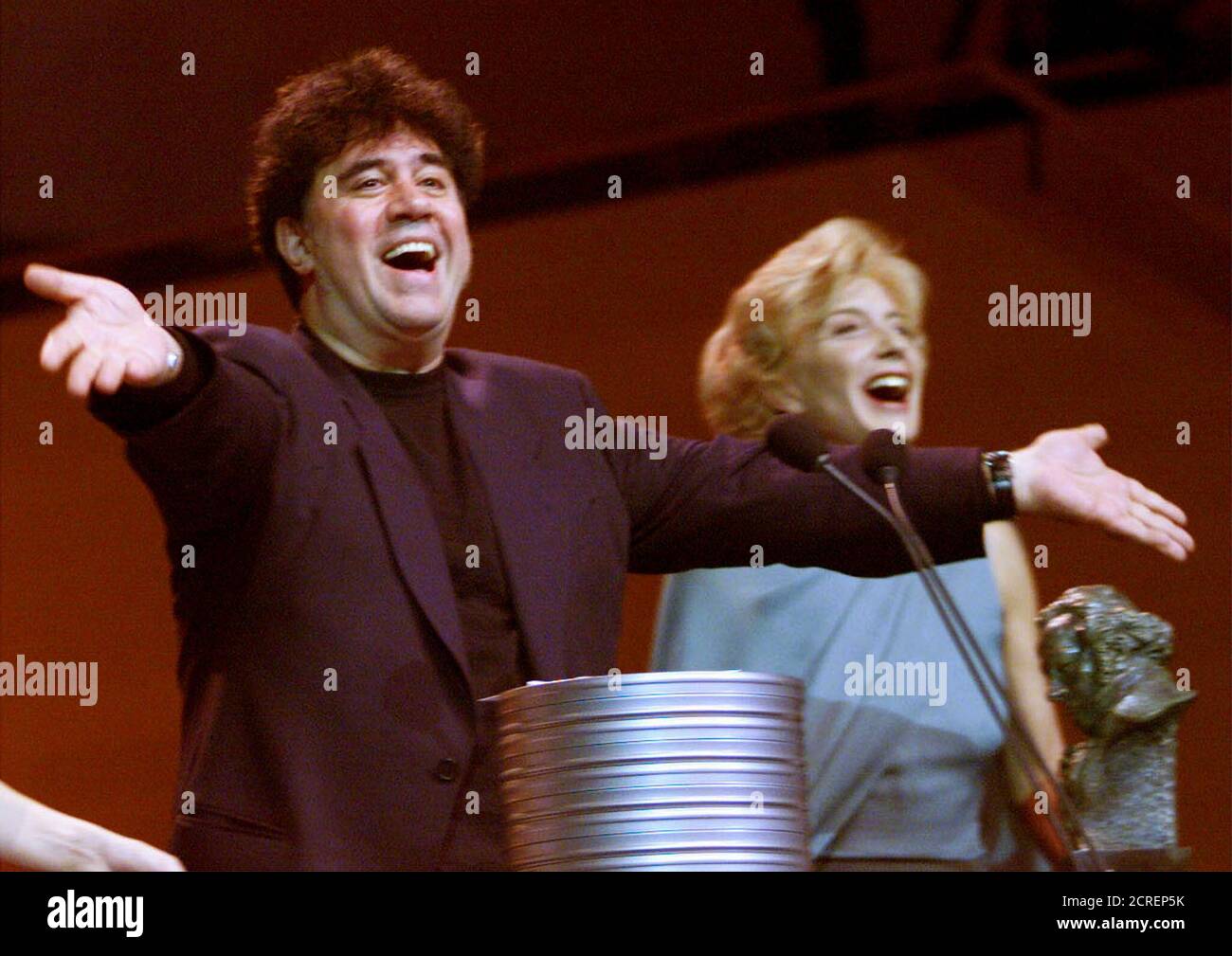 Director Pedro Almodovar and actress Marisa Paredes (R) sing happy birthday to Prince Felipe of Spain on his 32th birthday during the Spanish Film Academy awards in Barcelona January 30. Almodovar won the prize for best director for 'Todo sobre mi madre' (All About My Mother). The Goyas are the Spanish equivalent to the Oscars.  GN/GB Stock Photo