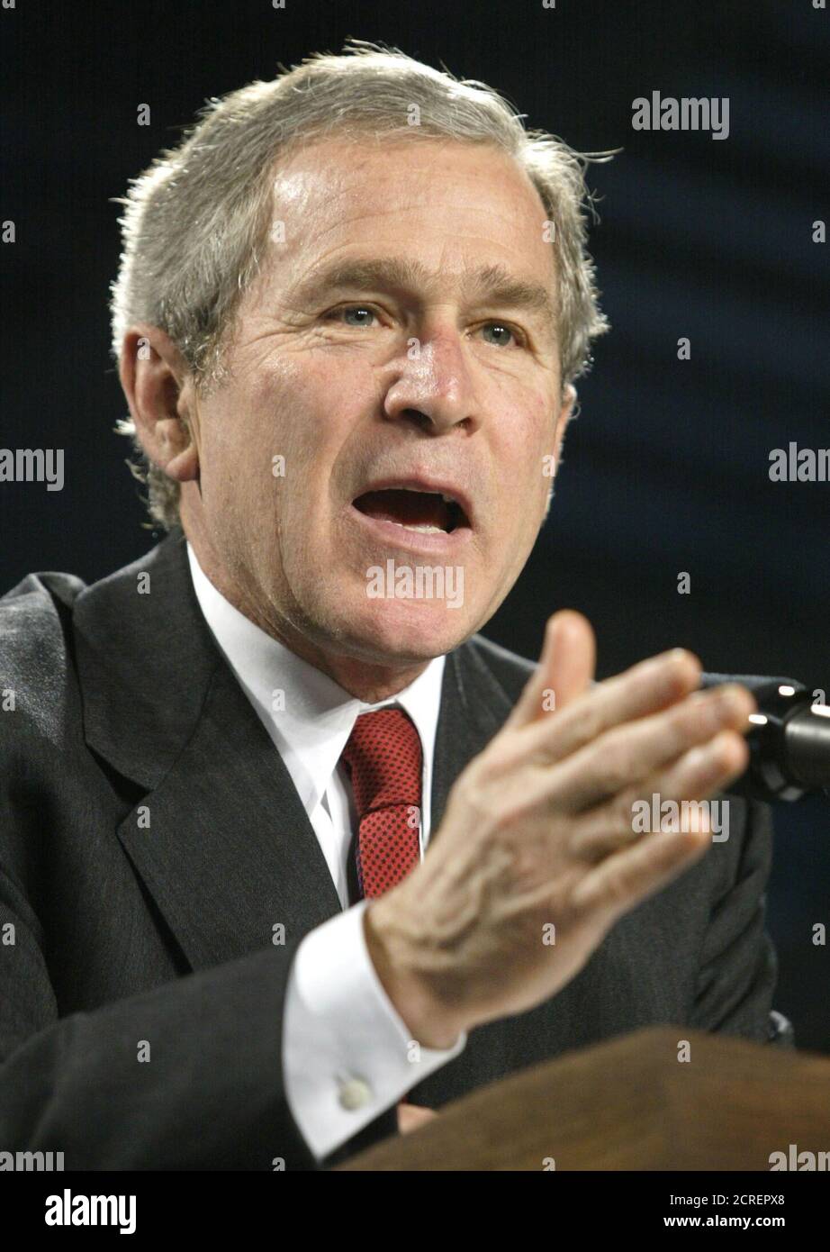 U.S. President George W. Bush speaks before signing a bill during a visit to Conshohocken, Pennsylvania, January 11, 2002. Bush traveled to Pennsylvania to sign the Small Business Liability Relief and Brownfields Revitalization Act, a five-year plan to provide up to $200 million annually to states, local governments and Indian tribes to clean up polluted sites, known as brownfields. REUTERS/Kevin Lamarque  KL/HB Stock Photo