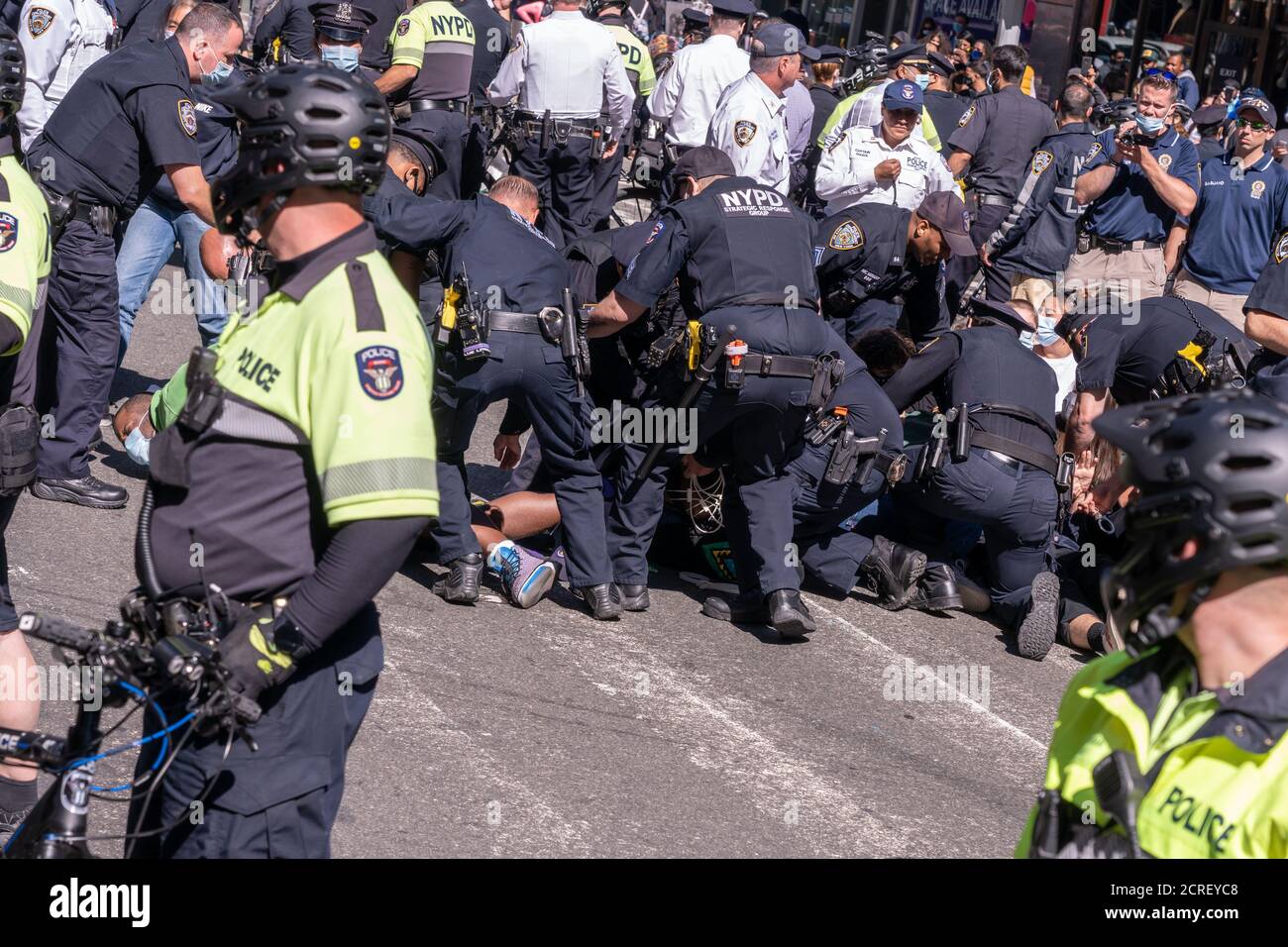 NEW YORK, NY - SEPTEMBER 19, 2020: Police arrest 86 people at a protest against the Immigration and Customs Enforcement agency (ICE) in Times Square. Stock Photo