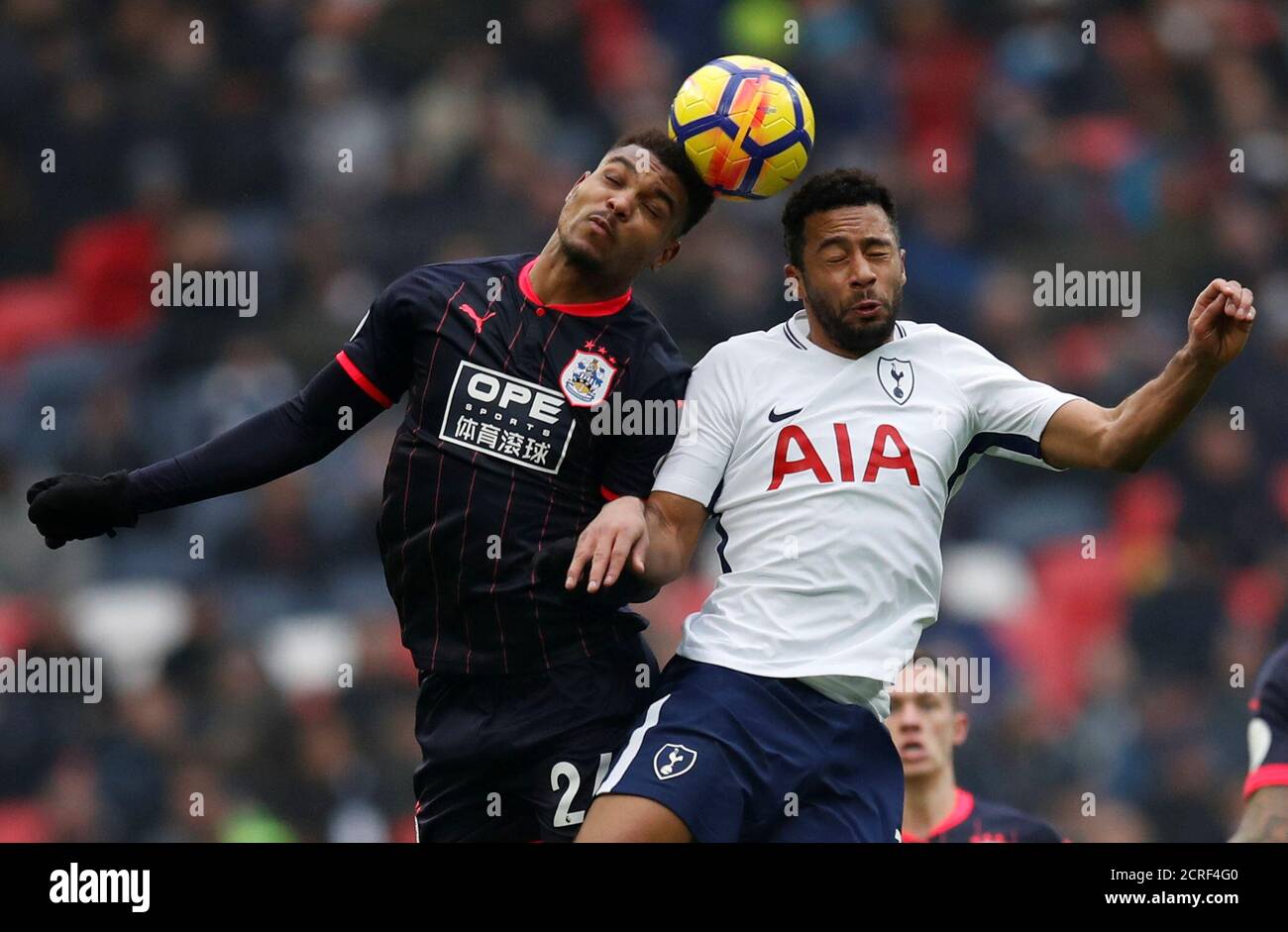 Soccer Football - Premier League - Tottenham Hotspur vs Huddersfield Town - Wembley Stadium, London, Britain - March 3, 2018   Tottenham's Mousa Dembele in action with Huddersfield Town’s Steve Mounie    REUTERS/Eddie Keogh    EDITORIAL USE ONLY. No use with unauthorized audio, video, data, fixture lists, club/league logos or 'live' services. Online in-match use limited to 75 images, no video emulation. No use in betting, games or single club/league/player publications.  Please contact your account representative for further details. Stock Photo