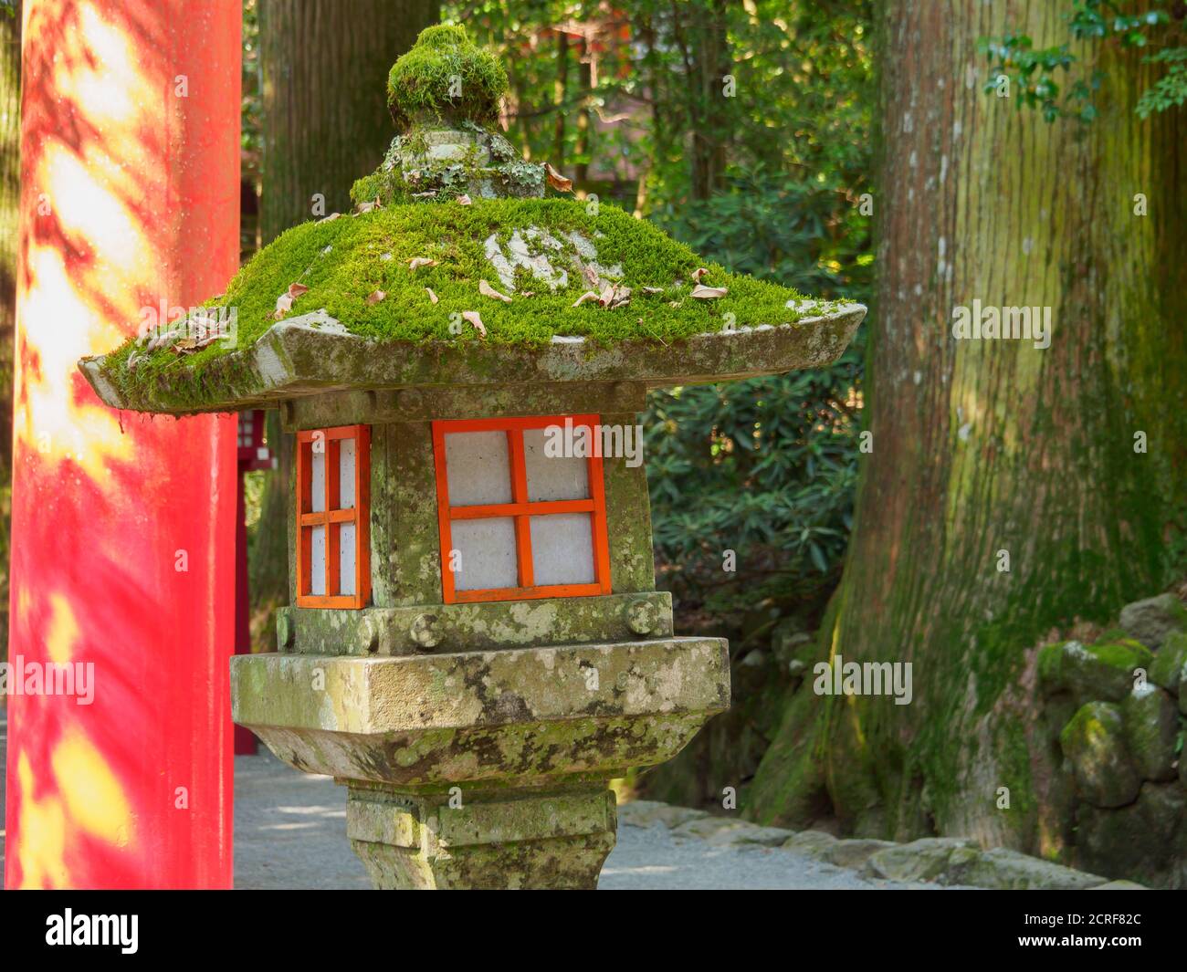 Stone lantern at a Buddhist temple in Hakone, Japan Stock Photo