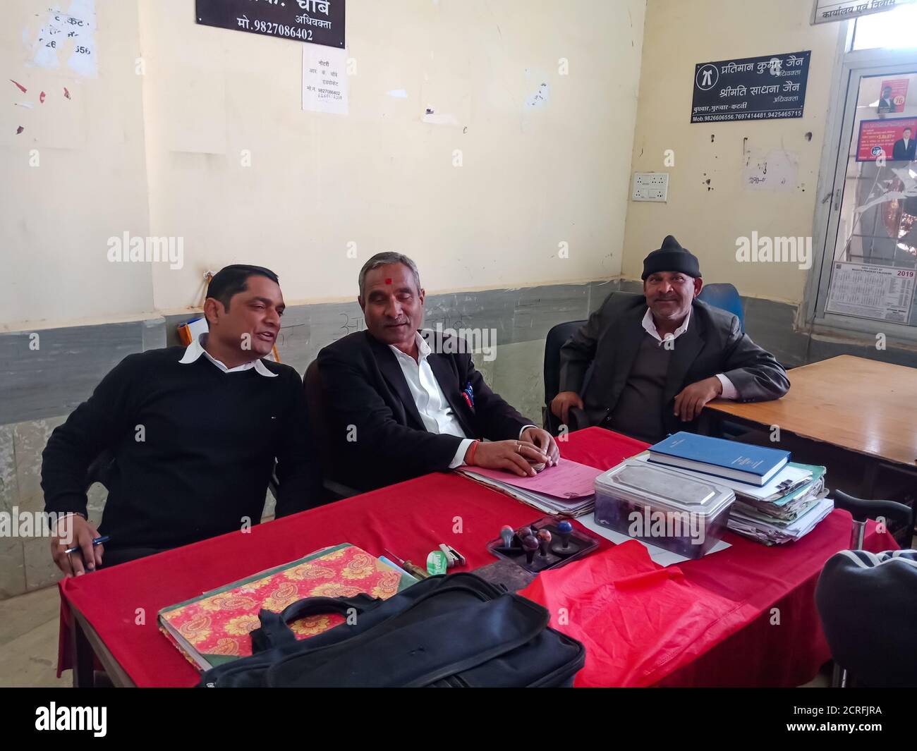 DISTRICT KATNI, INDIA - JANUARY 27, 2020: Indian lawyer group working in office room at Supreme court premises. Stock Photo