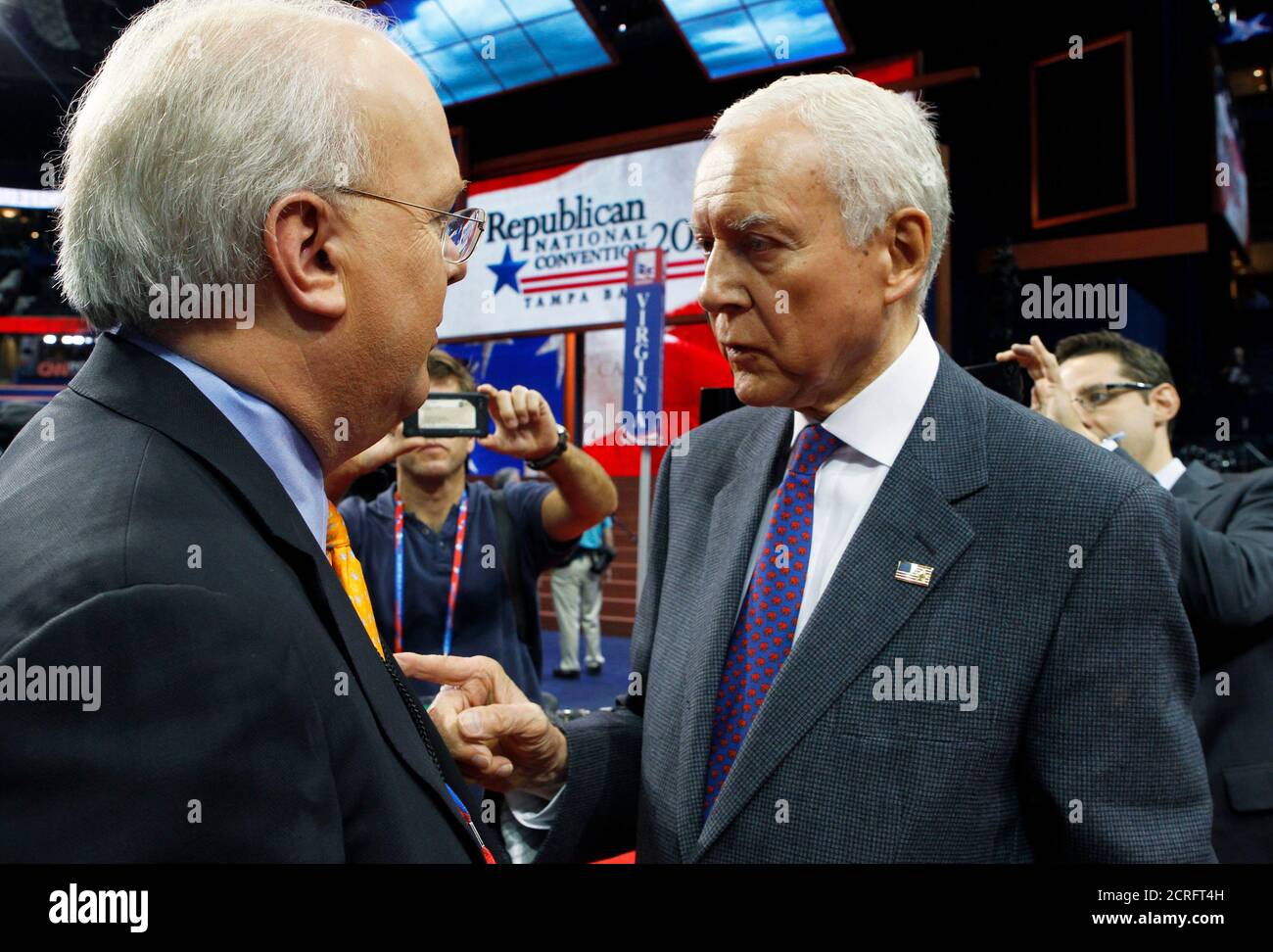 MSG: Republican political strategist Karl Rove (L) talks with U.S. Senator Orin Hatch (R-UT) on the floor of the Republican National Convention before the start of the opening session in Tampa, Florida August 27, 2012. REUTERS/Jim Bourg (UNITED STATES  - Tags: POLITICS ELECTIONS) Stock Photo