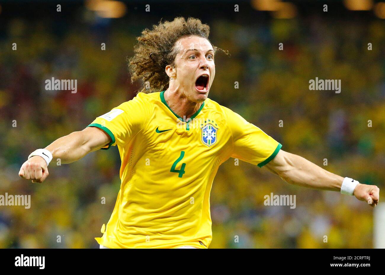 Brazil's David Luiz celebrates after scoring a goal against Colombia during the 2014 World Cup quarter-finals soccer match at the Castelao arena in Fortaleza July 4, 2014.   REUTERS/Stefano Rellandini (BRAZIL  - Tags: SOCCER SPORT WORLD CUP) Stock Photo
