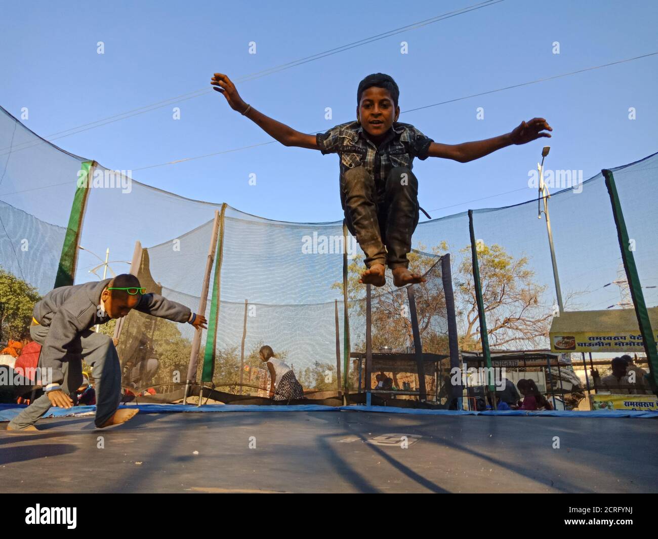 DISTRICT KATNI, INDIA FEBRUARY 02, 2020 Indian village boy jumping