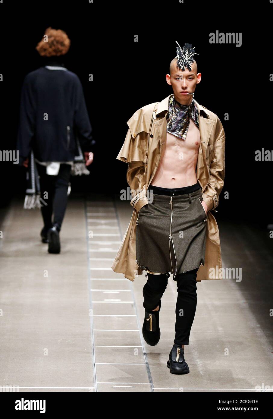 Models present creations by designer CHANU from his Autumn/Winter