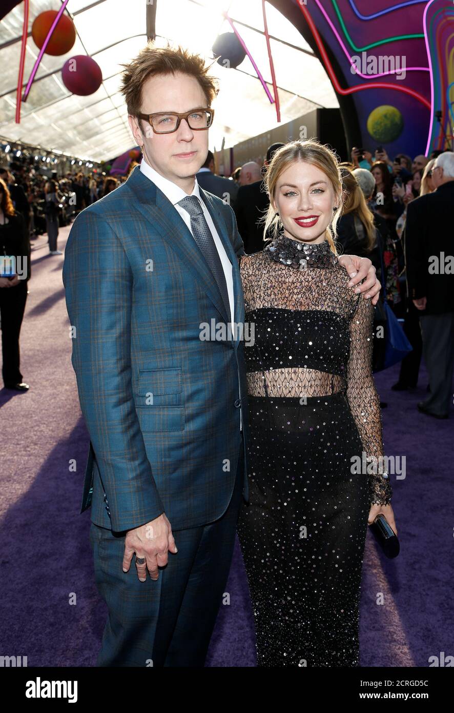 Writer and director James Gunn (L) and actress Jennifer Holland (R