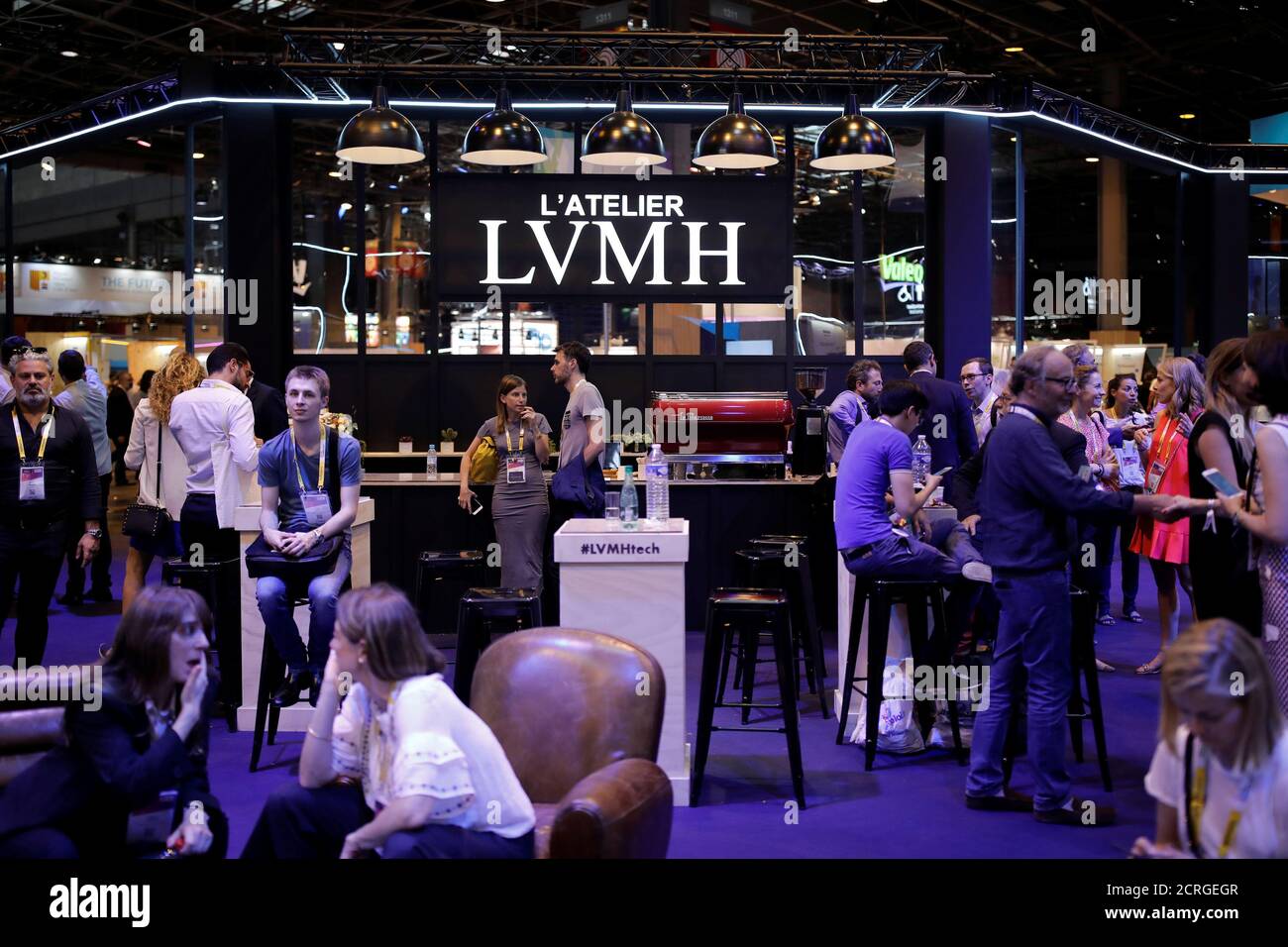 Attendees visit the LVMH Moet Hennessy Louis Vuitton SE technology workshop  at the Viva Technology conference in Paris, France, June 15, 2017.  REUTERS/Benoit Tessier Stock Photo - Alamy