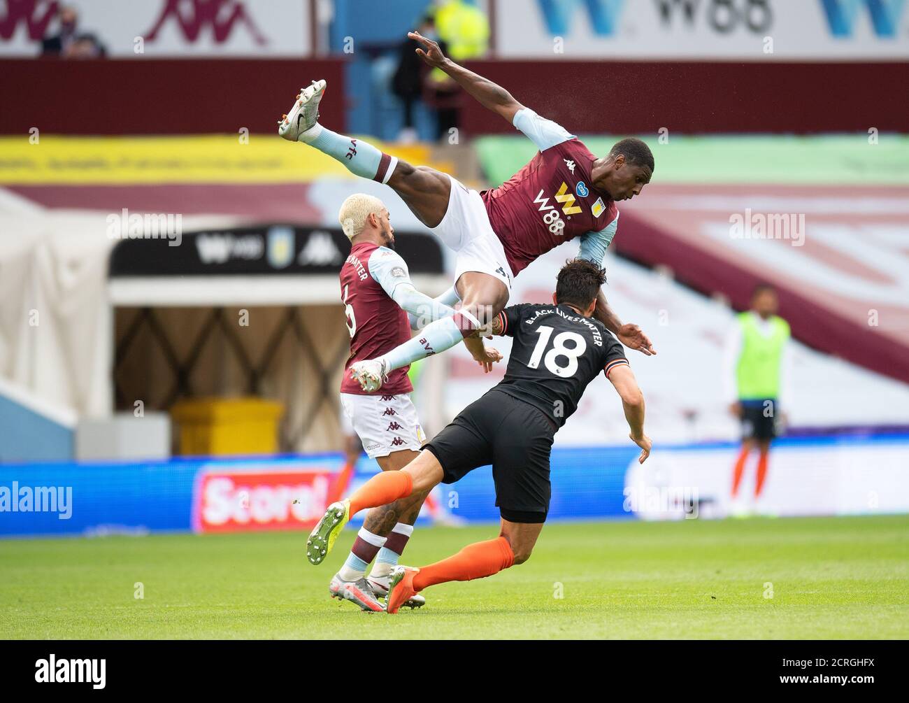 Olivier Giroud clashes with Kortney Hause during the Aston Villa v Chelsea Premier League match at Villa Park, Birmingham. PHOTO CREDIT: © MARK PAIN Stock Photo