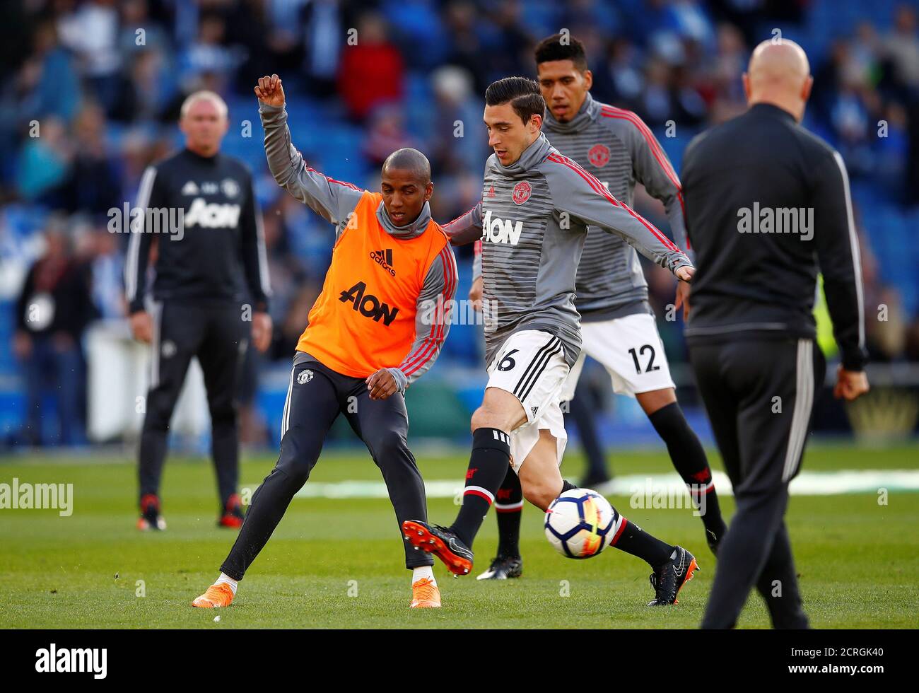 Soccer Football - Premier League - Brighton & Hove Albion v Manchester United - The American Express Community Stadium, Brighton, Britain - May 4, 2018 Manchester United's Ashley Young and Matteo Darmian during the warm up before the match REUTERS/Eddie Keogh EDITORIAL USE ONLY. No use with unauthorized audio, video, data, fixture lists, club/league logos or "live" services. Online in-match use limited to 75 images, no video emulation. No use in betting, games or single club/league/player publications. Please contact your account representative for further details. Stock Photo