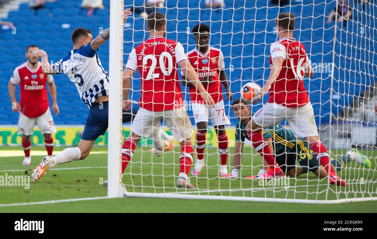 Lewis Dunk (number 5) equalises for Brighton during the Premier League match at the AMEX Stadium, Brighton.  PHOTO CREDIT : © MARK PAIN / ALAMY STOCK Stock Photo