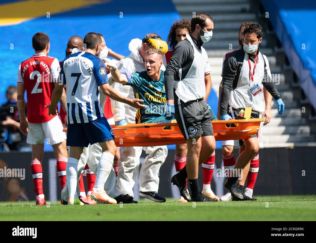 Arsenal goalkeeper Bernd Leno remonstrates with Neal Maupay as he is stretchered off. Brighton v Arsenal  PHOTO CREDIT : © MARK PAIN / ALAMY Stock Photo