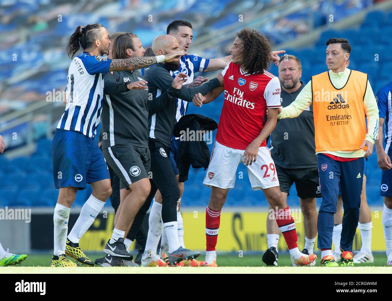 Matteo Guendouzi clashes with Brighton players at the final whistle during the Premier League match at the AMEX Stadium, Brighton.   PHOTO CREDIT : © Stock Photo