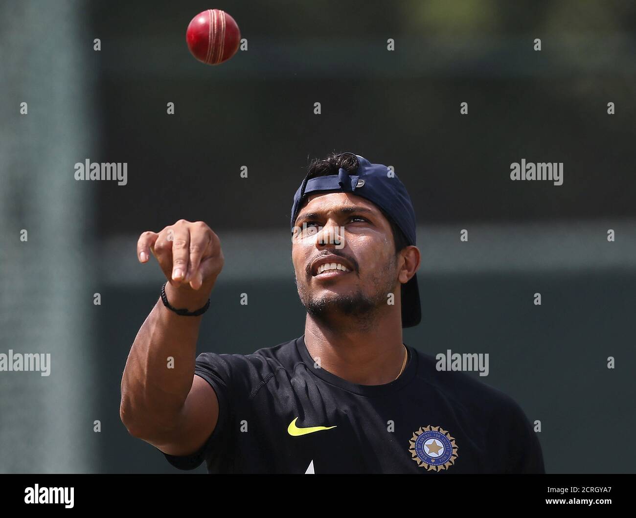 India's Umesh Yadav tosses the ball during a practice session ahead of their third and final test cricket match against Sri Lanka in Colombo August 27, 2015. REUTERS/Dinuka Liyanawatte Stock Photo