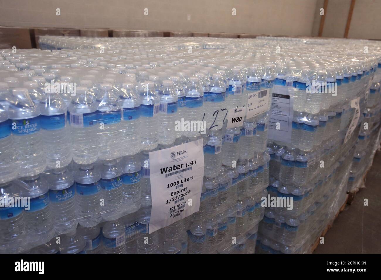 Stacks of bottled water are held at the Food Bank of Eastern Michigan warehouse and will be distributed to the public, after elevated lead levels were found in the city's water, in Flint, Michigan, December 16, 2015.     REUTERS/Rebecca Cook Stock Photo