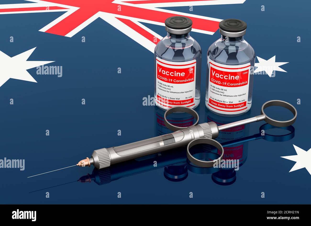 Vaccination in Australia concept. Vaccine bottles with syringe on the Australian flag, 3D rendering isolated on white background Stock Photo