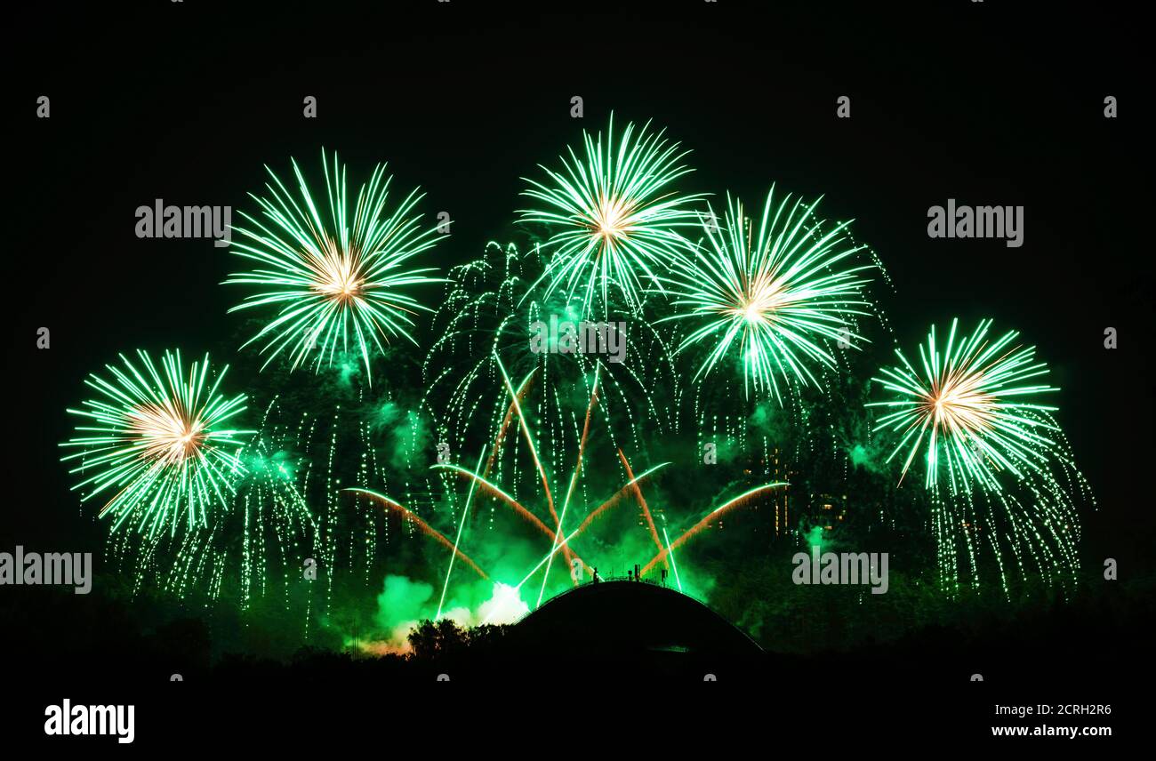 Vilnius fireworks festival. Green fireworks, explode Stock Photo