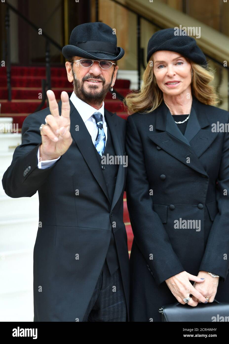 Ringo Starr, who's real name is Richard Starkey, arrives with his wife  Barbara Bach to receive his Knighthood at an Investiture ceremony at  Buckingham palace in London, Britain, March 20, 2018. John