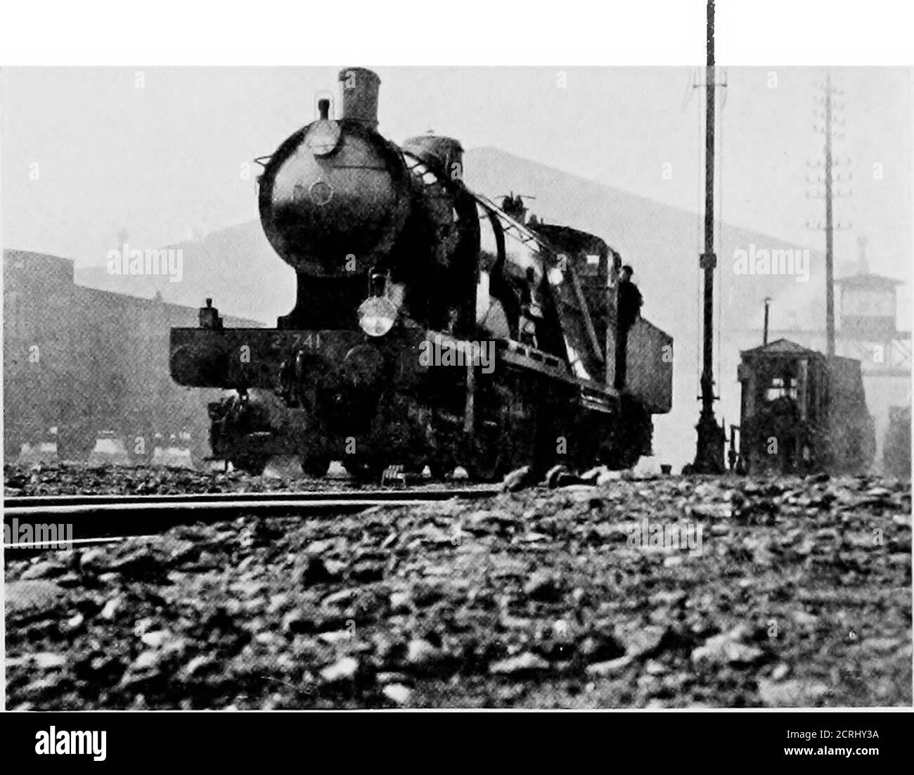 . French railways . NORD ESGINE 2.7il. is chietly remarkable for the construction of thefirebox, which is composed of a series of watertubes of small diameter, to which the water isconducted through large circulating pipes. Ad-vantage being taken of the great strength of thewater tubes, the steam pressure has been in-creased to 25() lb. per square inch. Except that FRENCH RAILWAYS 63 the trailing end of the engine is carried on a bogieinstead of one pair of small wheels, the generalarrangement is the same as with the 4-4-2engines.. NOED ENGINE 2.741 (ANOTHER VIEW). As with the passenger engine Stock Photo