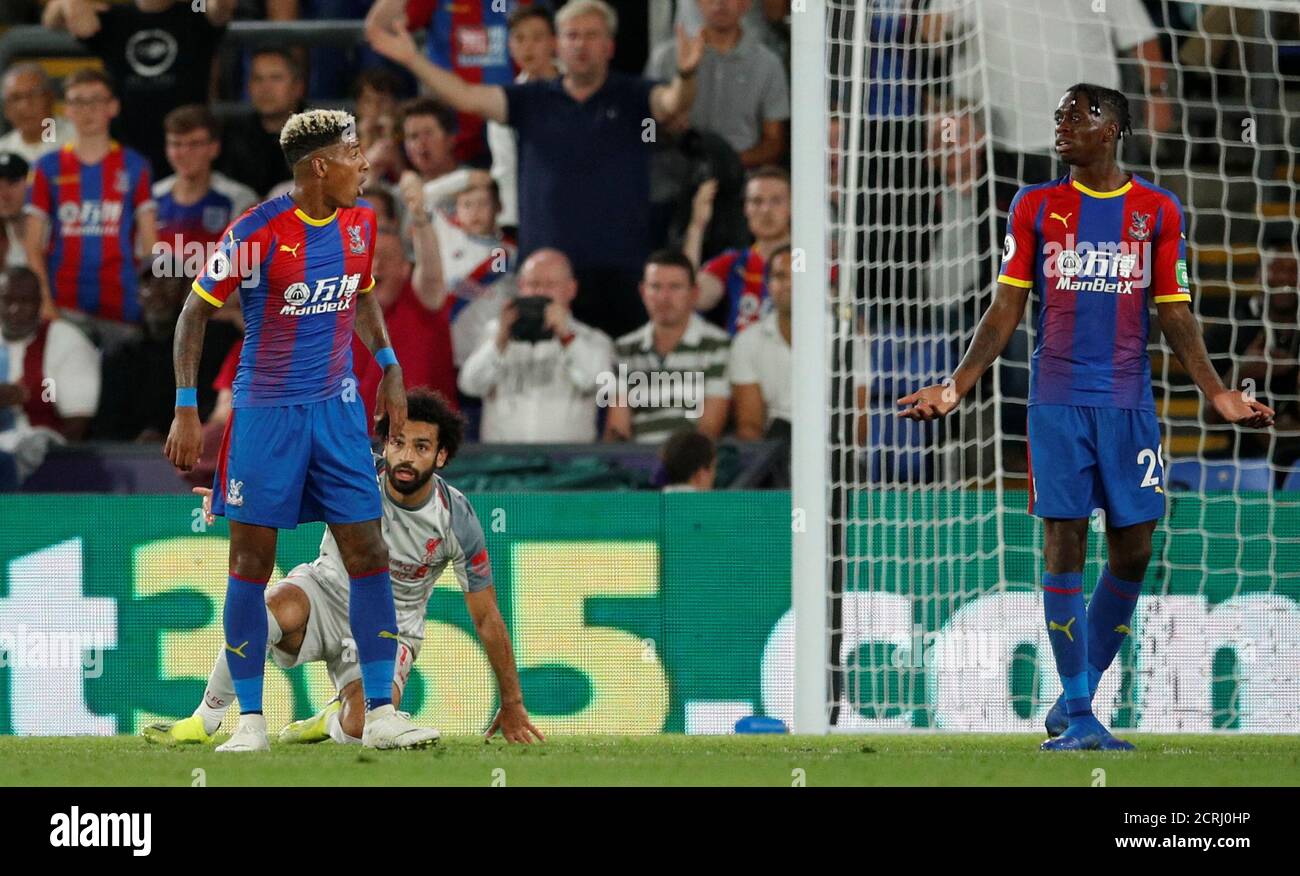 Soccer Football - Premier League - Crystal Palace v Liverpool - Selhurst Park, London, Britain - August 20, 2018  Crystal Palace's Aaron Wan-Bissaka concedes a foul against Liverpool's Mohamed Salah and is subsequently shown a red card by the referee                      Action Images via Reuters/John Sibley  EDITORIAL USE ONLY. No use with unauthorized audio, video, data, fixture lists, club/league logos or 'live' services. Online in-match use limited to 75 images, no video emulation. No use in betting, games or single club/league/player publications.  Please contact your account representati Stock Photo