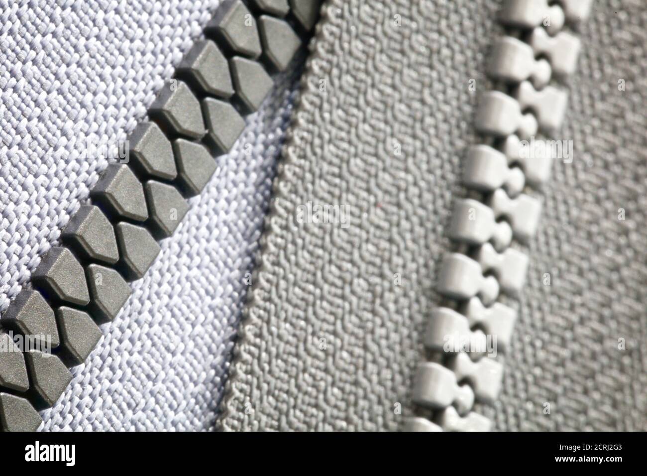 Close-up zip gray background texture, hobby diy concept Stock Photo - Alamy
