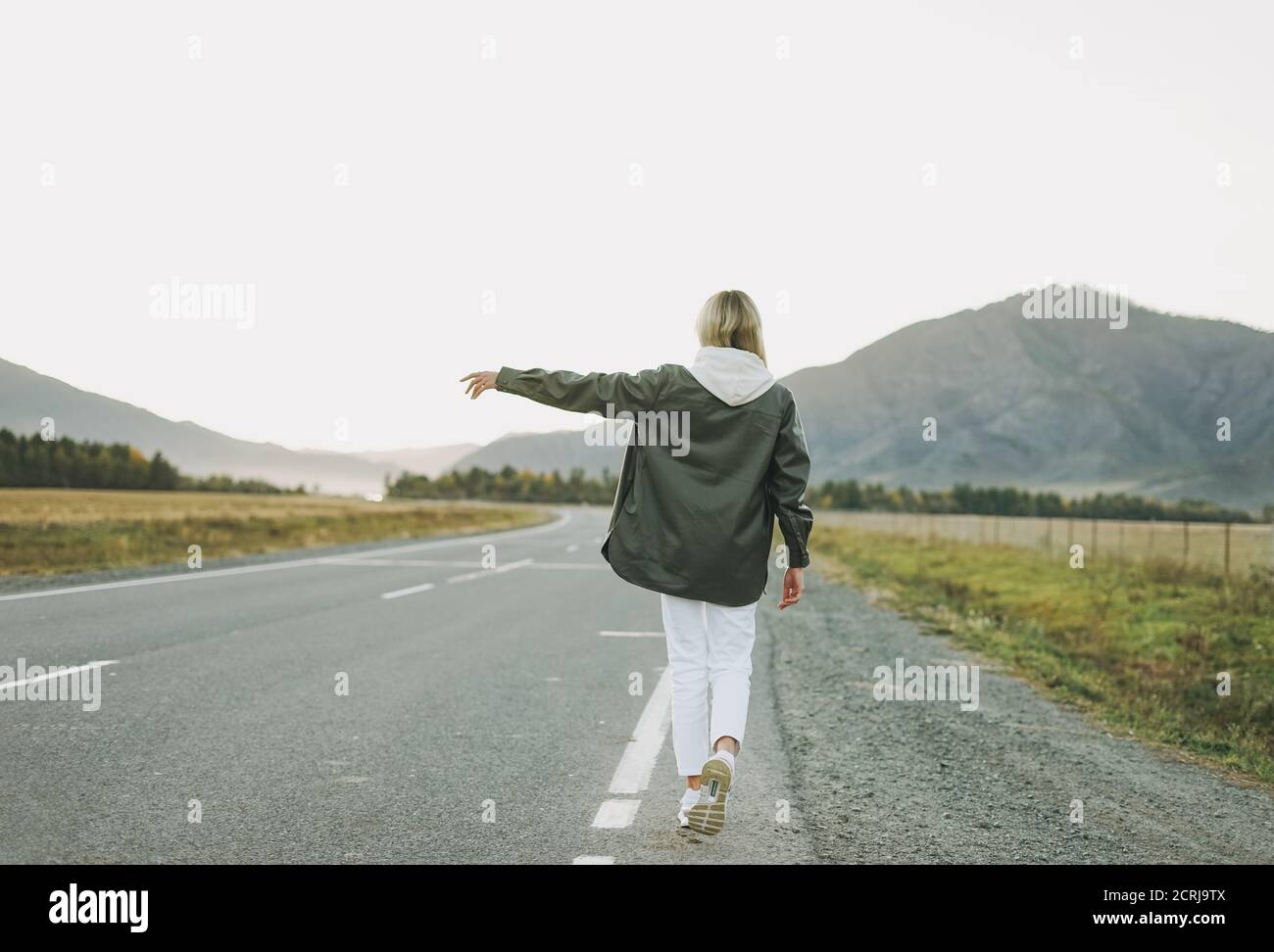 Woman hitching a ride hi-res stock photography and images - Alamy