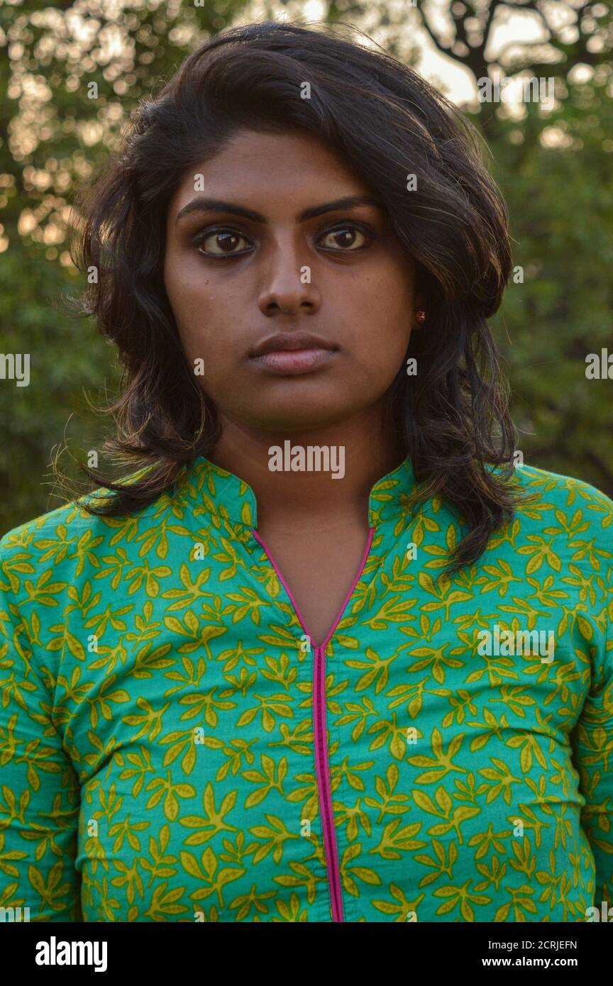 Image of A Indian Girl Poses For Portfolio Shoot At Outside Of  Studio.-FE498746-Picxy