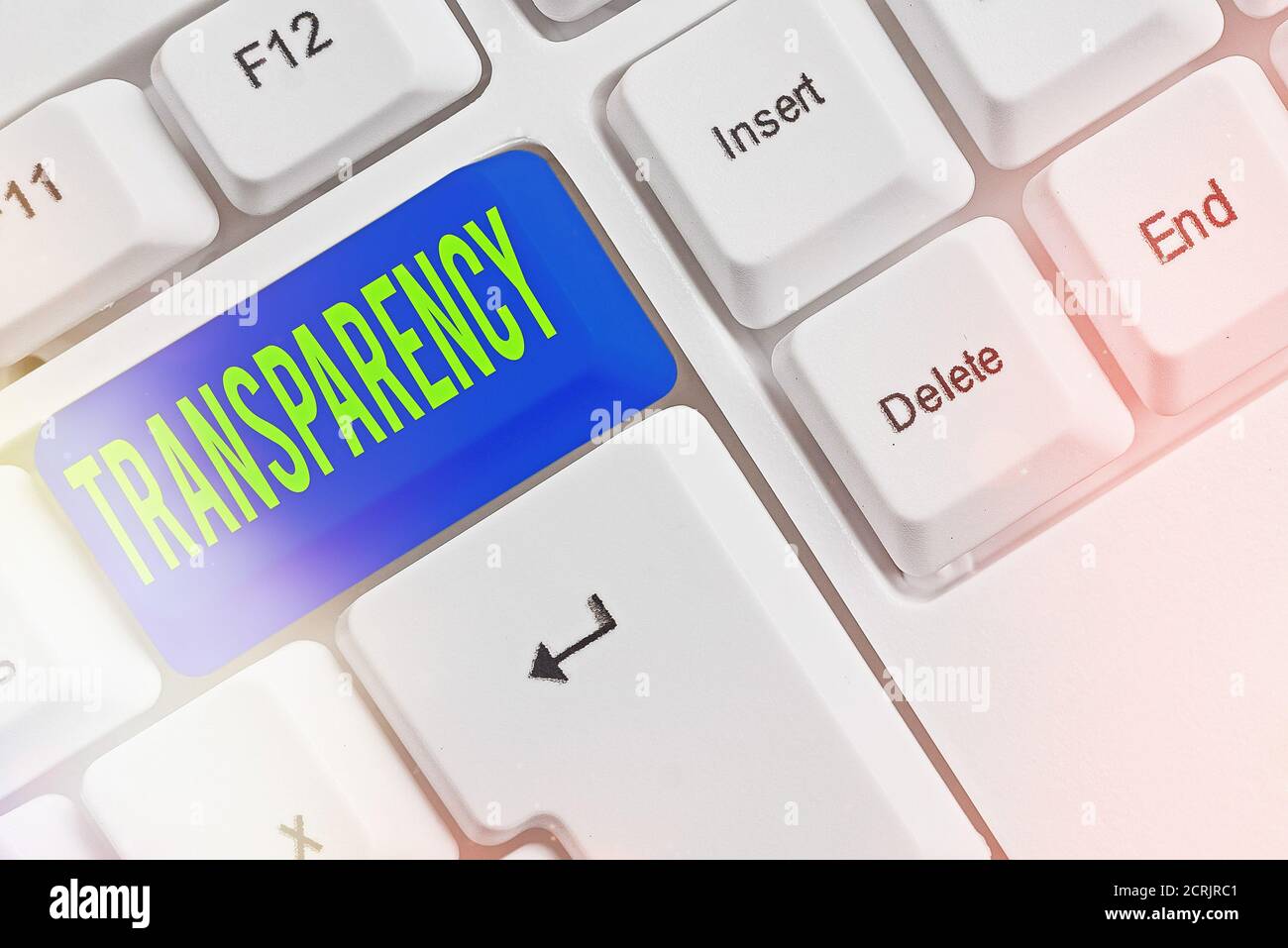 Text sign showing Transparency. Business photo showcasing something transparent especially a picture viewed by light Different colored keyboard key wi Stock Photo