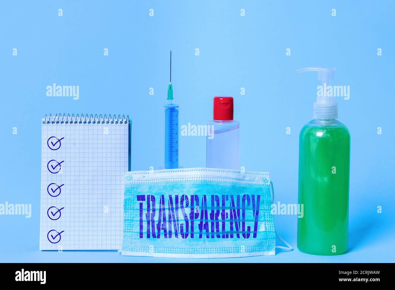 Writing note showing Transparency. Business concept for something transparent especially a picture viewed by light Set of medical equipment with notep Stock Photo