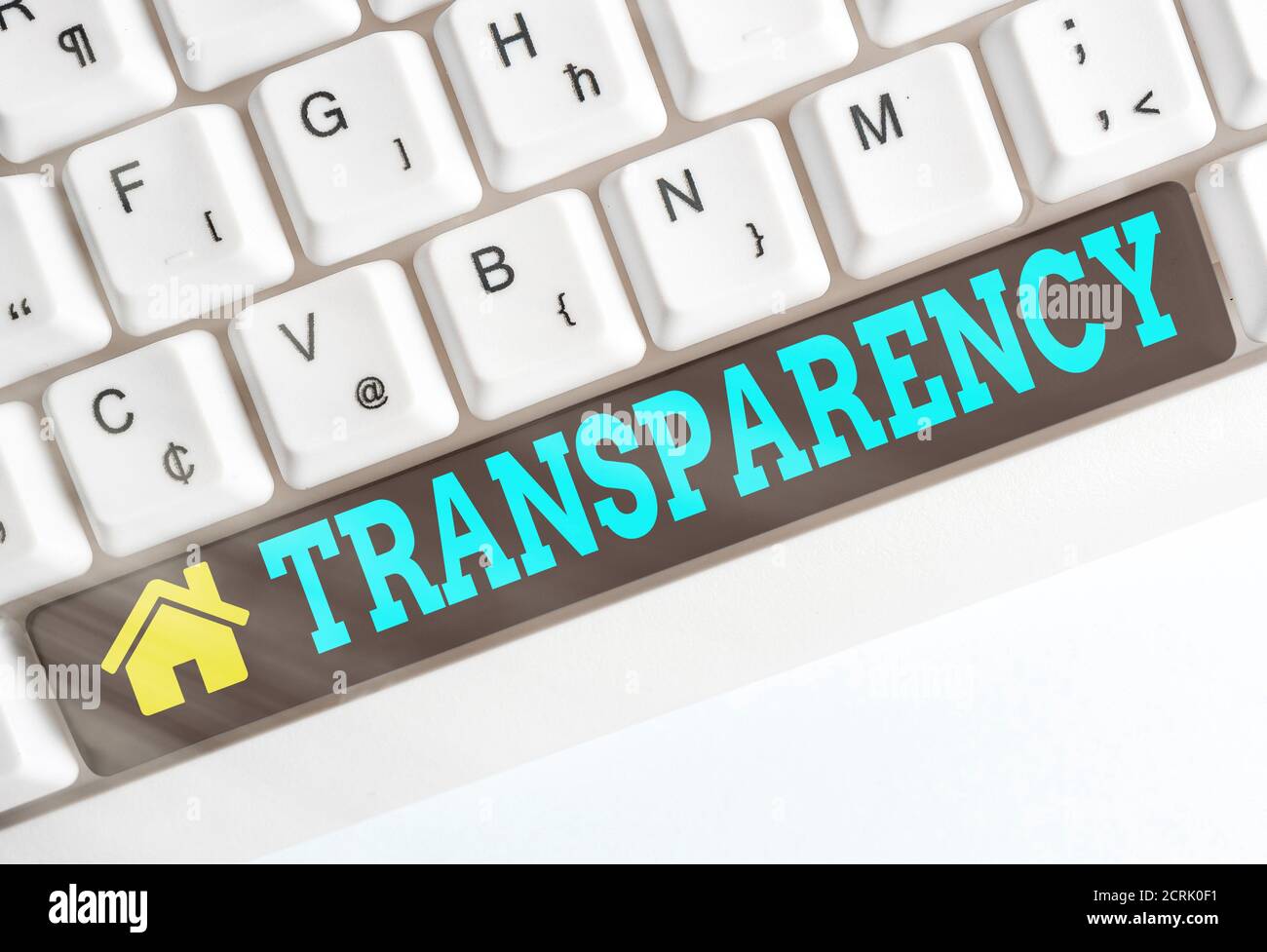 Text sign showing Transparency. Business photo showcasing something transparent especially a picture viewed by light Different colored keyboard key wi Stock Photo