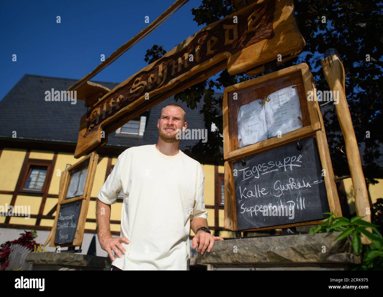 Dresden, Germany. 15th Sep, 2020. Sebastian Mai, captain of the third division football team SG Dynamo Dresden, is standing in front of the entrance of the Alte Schmiede restaurant. Credit: Robert Michael/dpa-Zentralbild/dpa/Alamy Live News Stock Photo