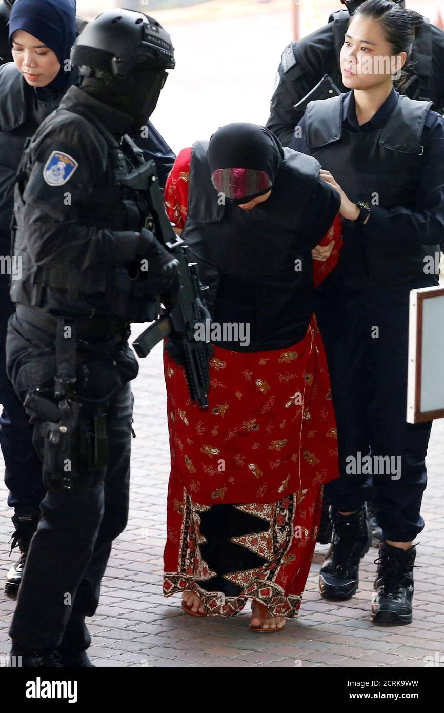 Indonesian Siti Aisyah Who Is On Trial For The Killing Of Kim Jong Nam The Estranged Half Brother Of North Korea S Leader Is Escorted As She Arrives At The Shah Alam High Court