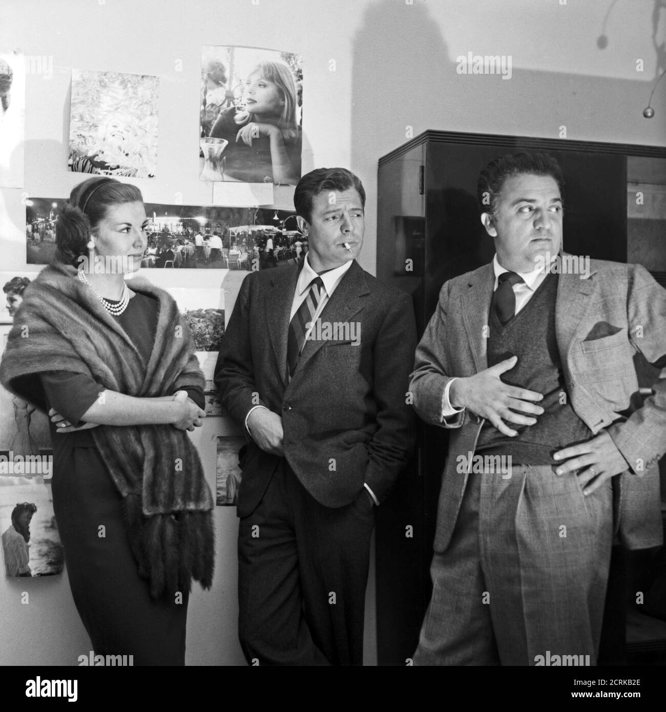 Tthe actors Madeleine Fischer and Marcello Mastroianni and the director Federico Fellini, Rome, October 1958. Stock Photo