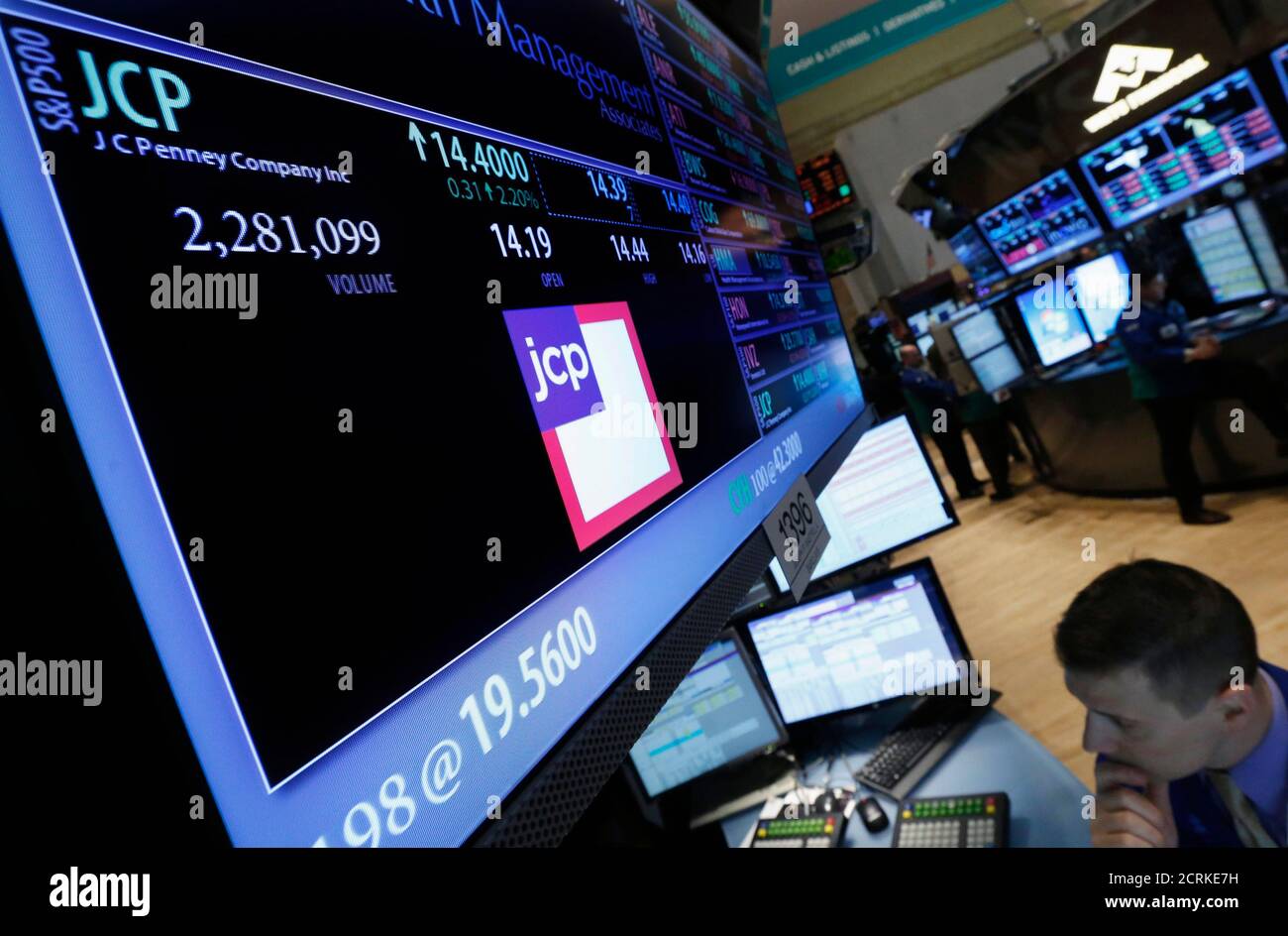 The Ticker Symbol For Jc Penney Is Displayed At The Booth Trading The Stock On The