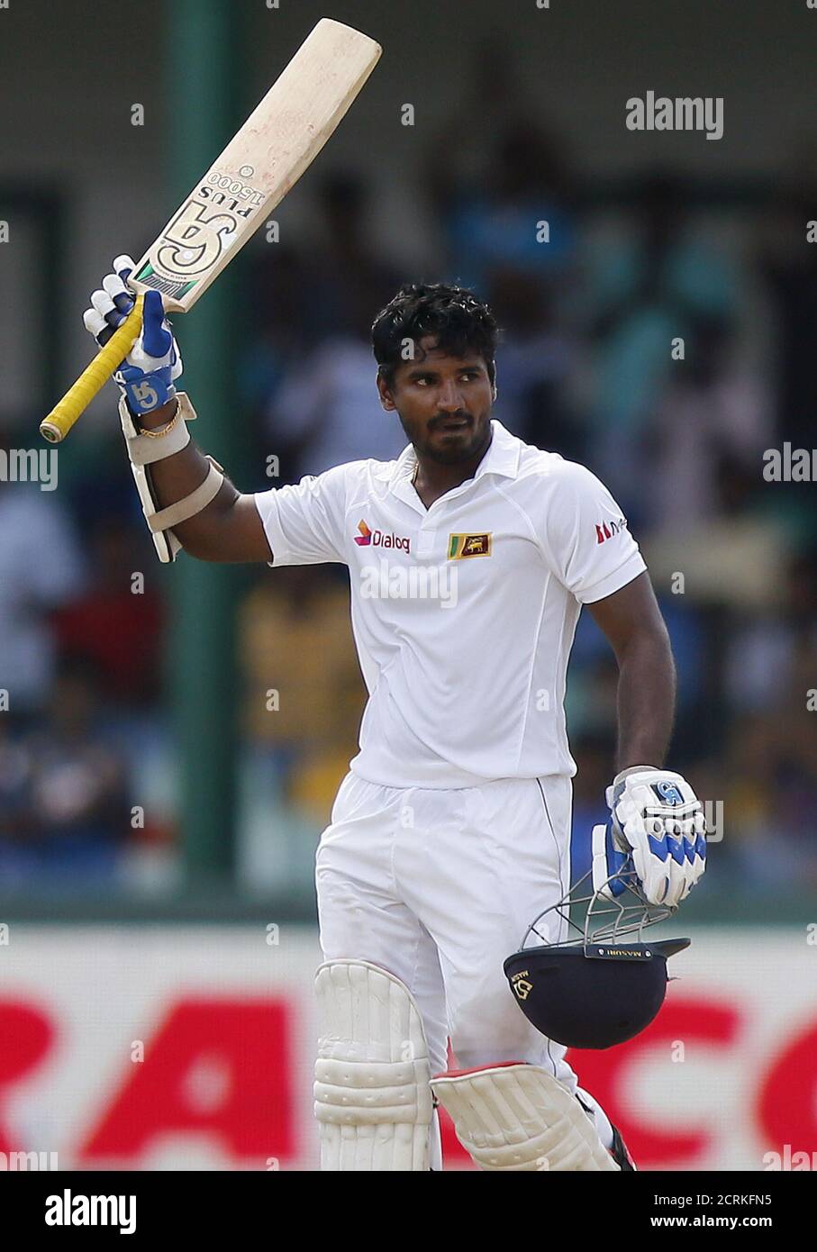 Sri Lanka's Kusal Perera celebrates his half century during the third day of their third and final test cricket match against India in Colombo, August 30, 2015. REUTERS/Dinuka Liyanawatte Stock Photo