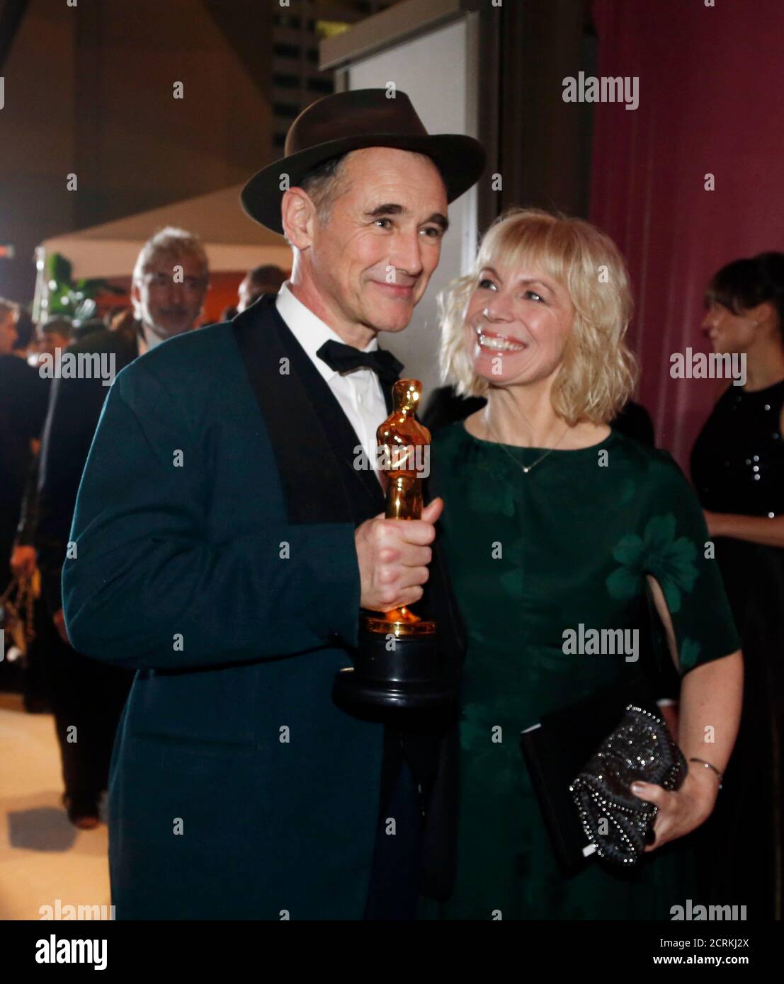 Mark Rylance, winner for Best Supporting Actor for his role in 'Bridge of Spies', arrives with his wife playwright Claire van Kampen at the Governors Ball following the 88th Academy Awards in Hollywood, California February 28, 2016.  REUTERS/Lucy Nicholson Stock Photo