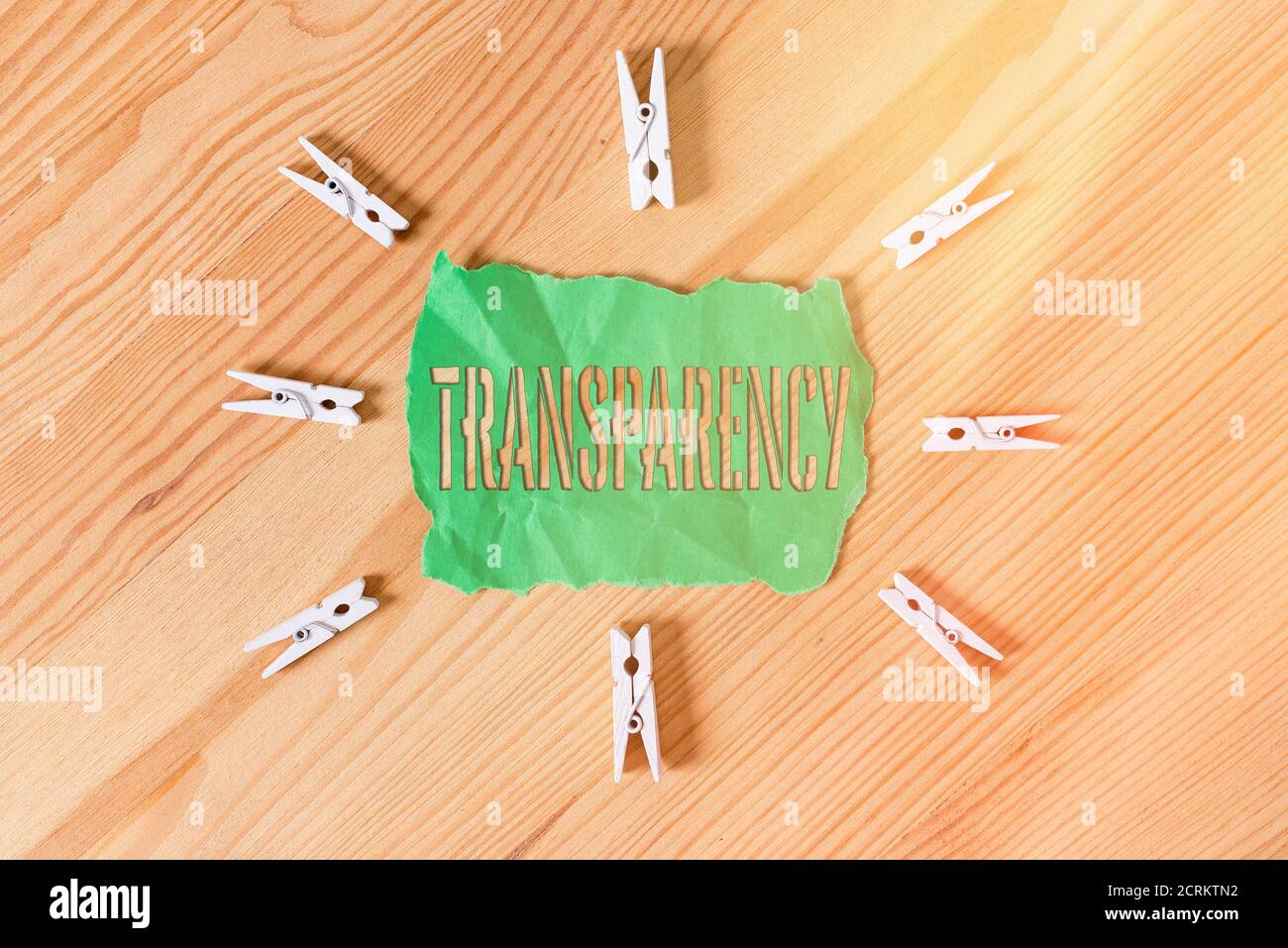 Text sign showing Transparency. Business photo text something transparent especially a picture viewed by light Colored clothespin papers empty reminde Stock Photo
