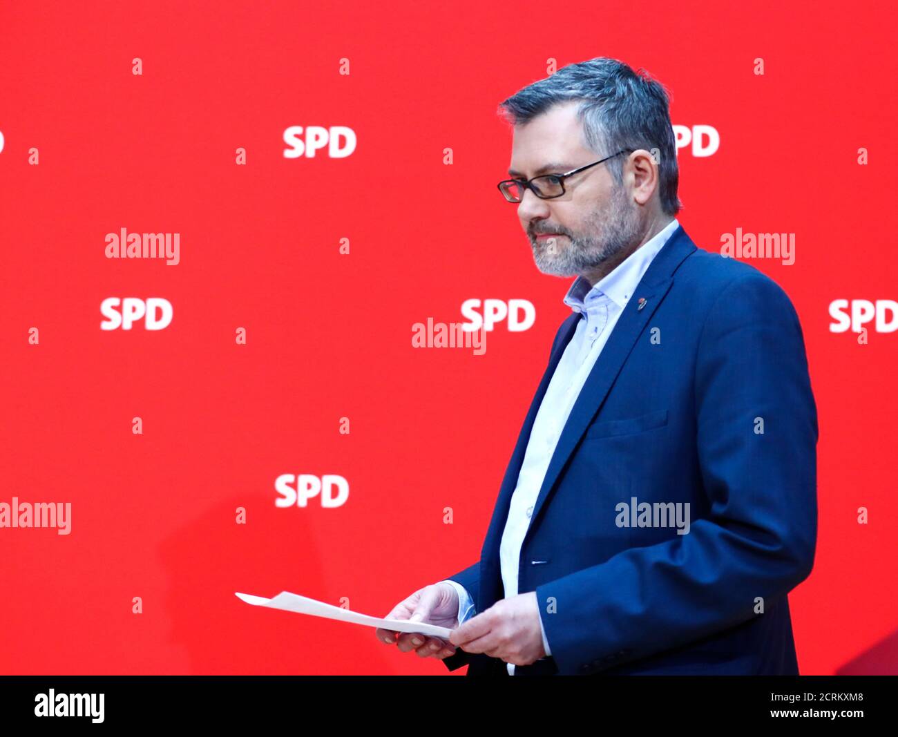 Dietmar Nietan  of Social Democratic Party (SPD) arrives to the news conference to announce the results of the voting for a possible coalition between the Social Democratic Party (SPD) and the Christian Democratic Union (CDU) in Berlin, Germany March 4, 2018. REUTERS/Hannibal Hanschke Stock Photo