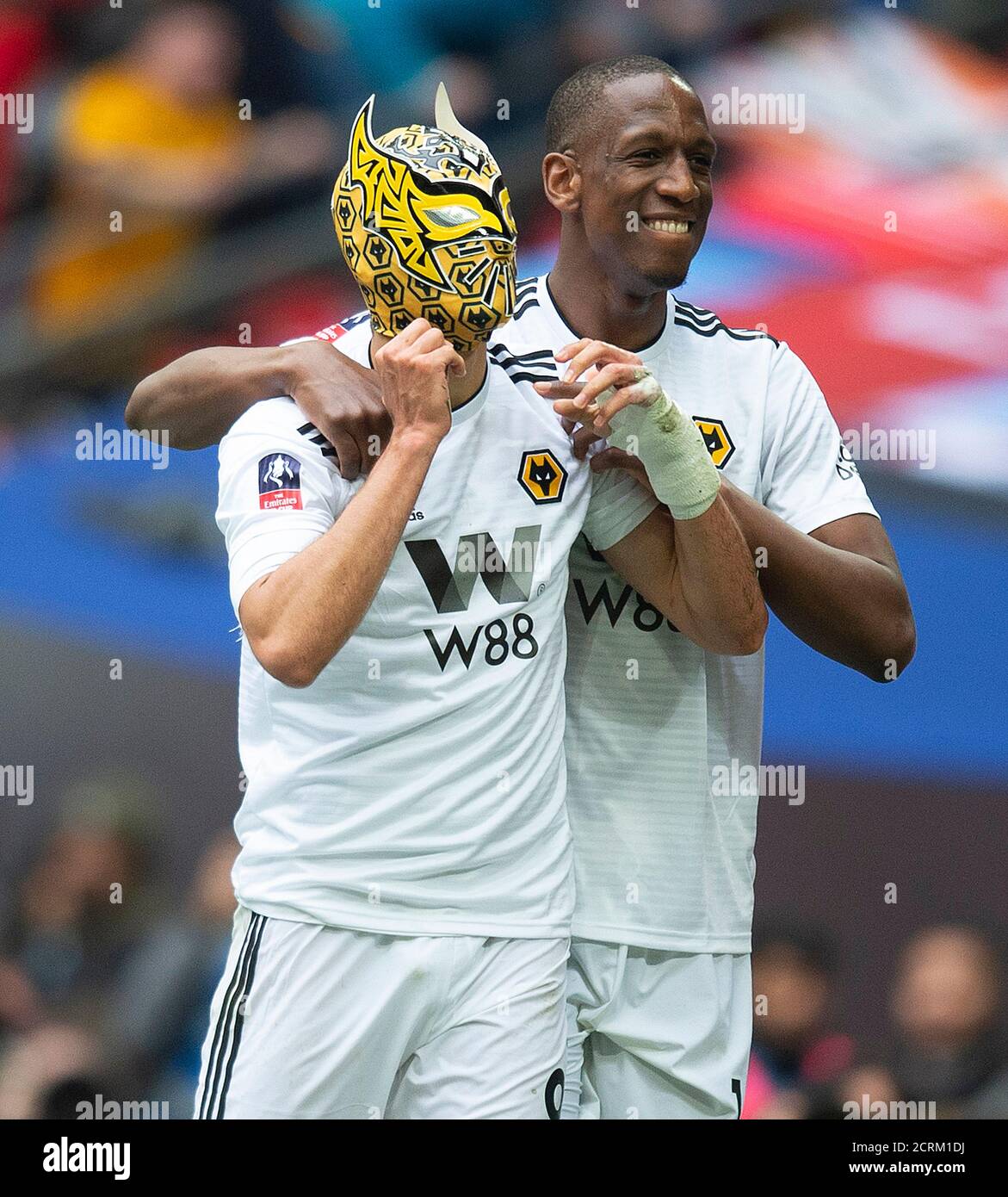 Wolverhampton's Raul Jimenez celebrates his second goal by putting on a mask.  Picture Credit : © MARK PAIN / ALAMY Stock Photo - Alamy