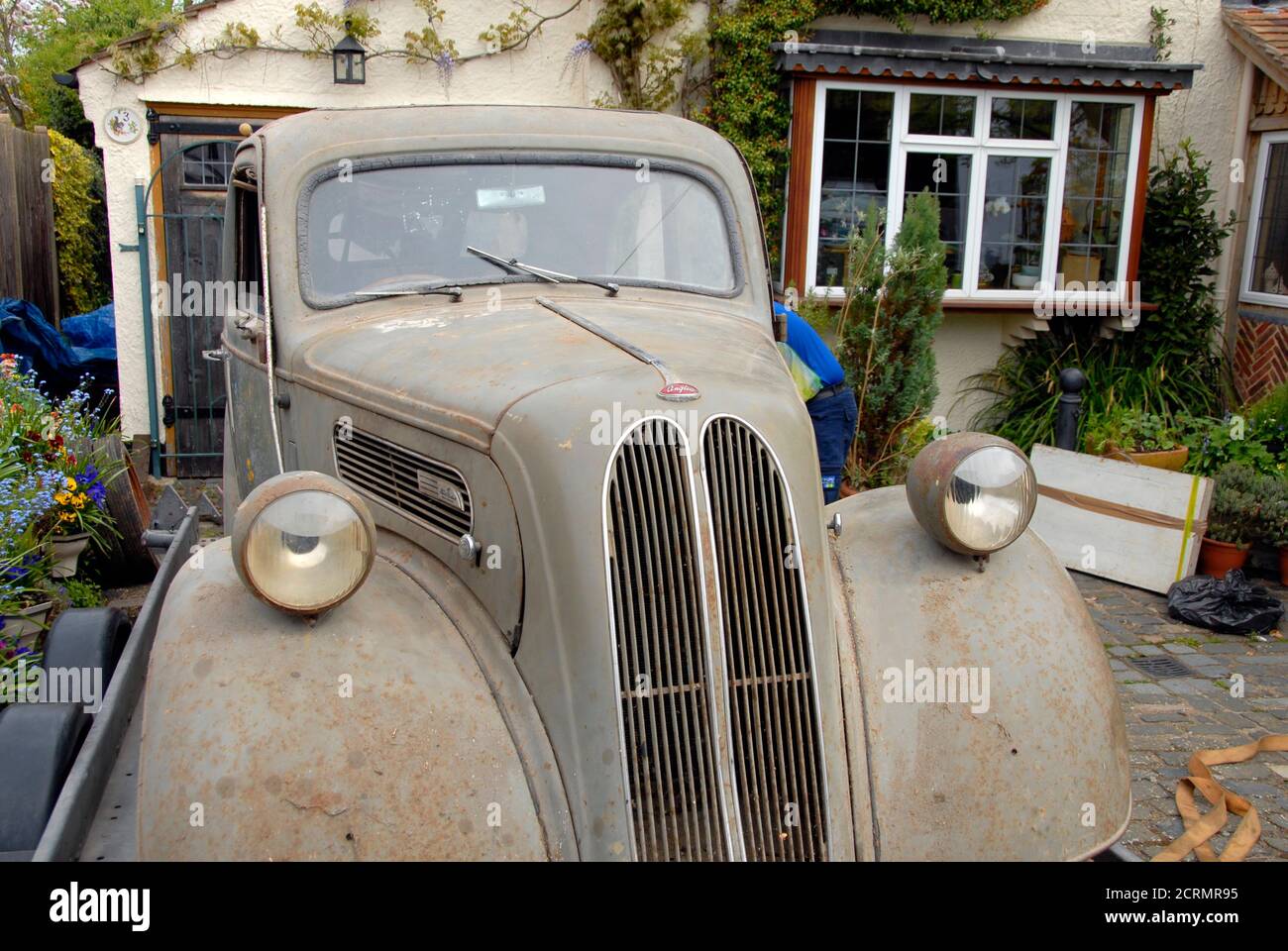 Very old Ford Anglia car, England, in need of renovation Stock Photo