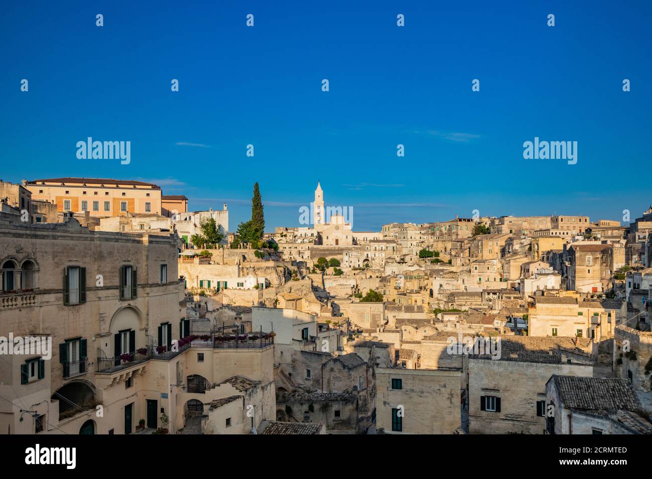 Matera, Basilicata, Italy - Panoramic view of the Sassi of Matera, Caveoso. The ancient houses of stone and brick, carved into the rock. The cathedral Stock Photo