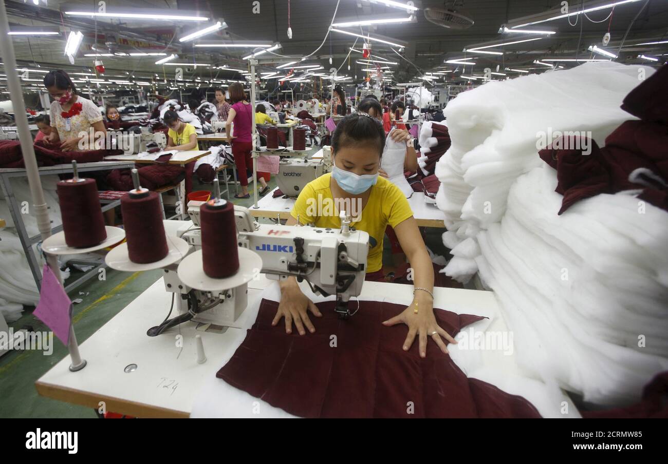 Labourers work to make Zara jackets at a garment factory in Bac Giang  province, near Hanoi October 21, 2015. Vietnam's textiles and footwear  would gain strongly from the TPP, after exports of