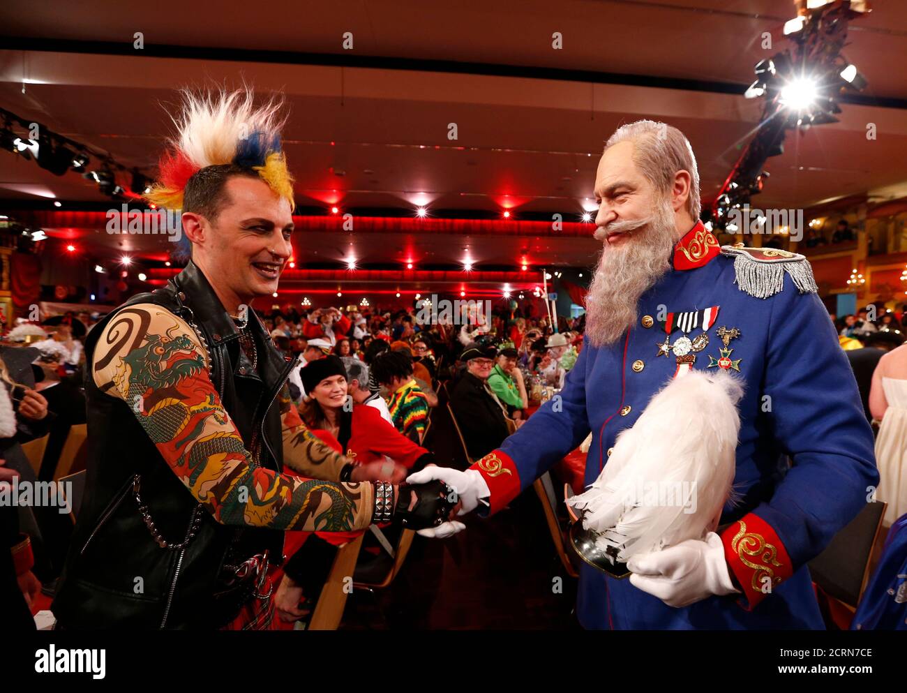 Bavarian Finance Minister Markus Soeder (R) shakes hands with the guest ...