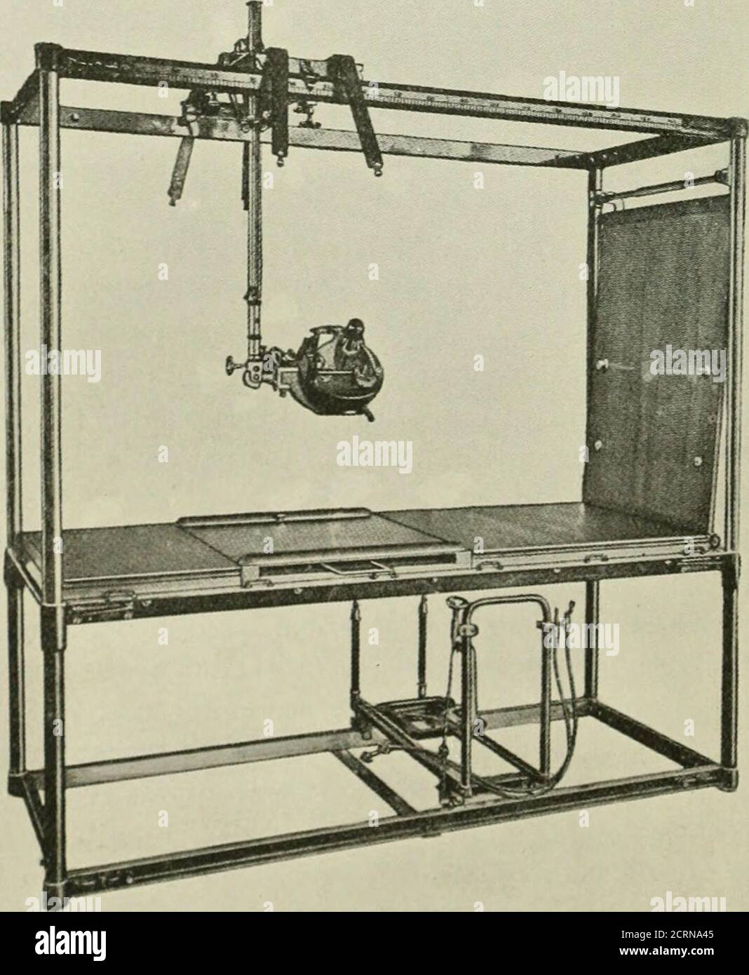 Radiography and radio-therapeutics . Fig. 91.—A conveuient form of X-ray  couch. (Sieiueus.) Fitted with a protected tube-box, the top of the table  is so constructed that the patient may bemoved in