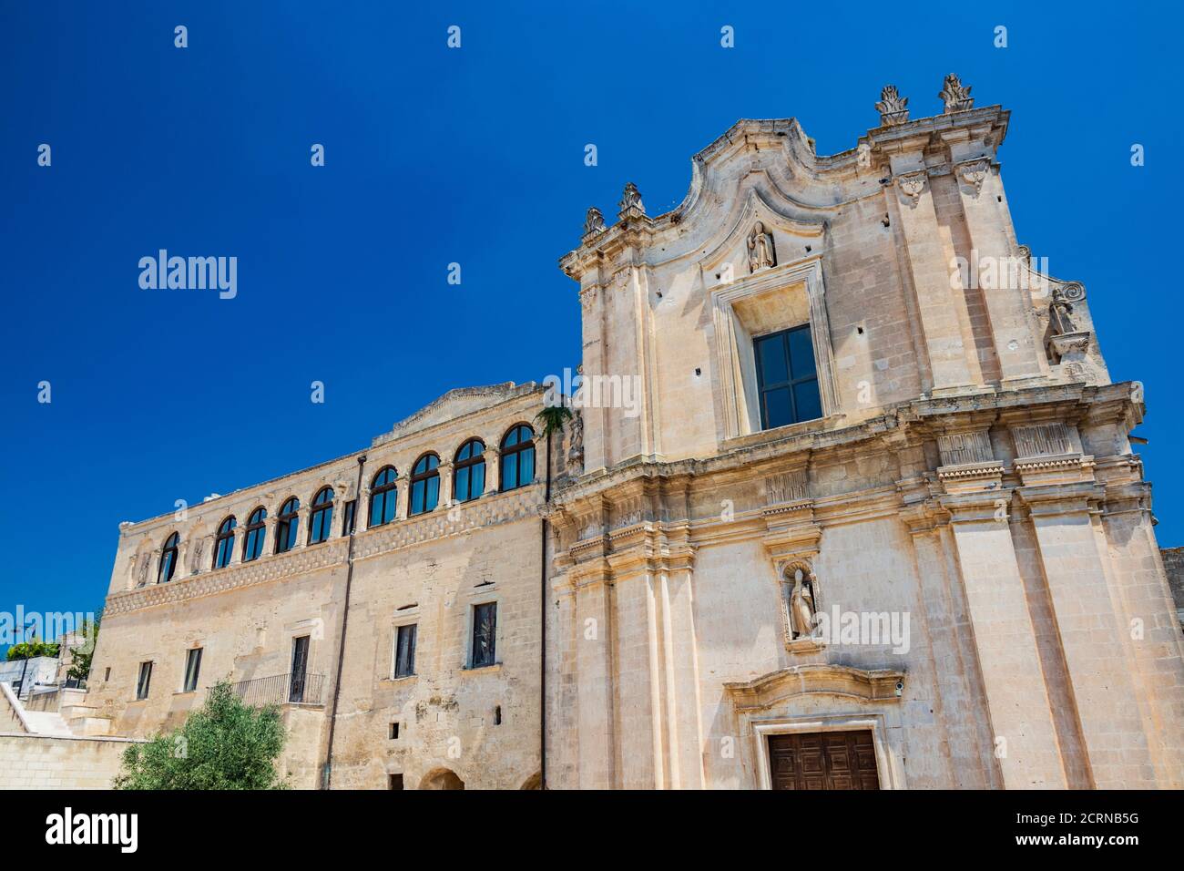 Matera, Basilicata, Italy - The church and convent of Sant'Agostino, in the Sasso Barisano, built on the ancient rupestrian crypt of San Giuliano. Stock Photo