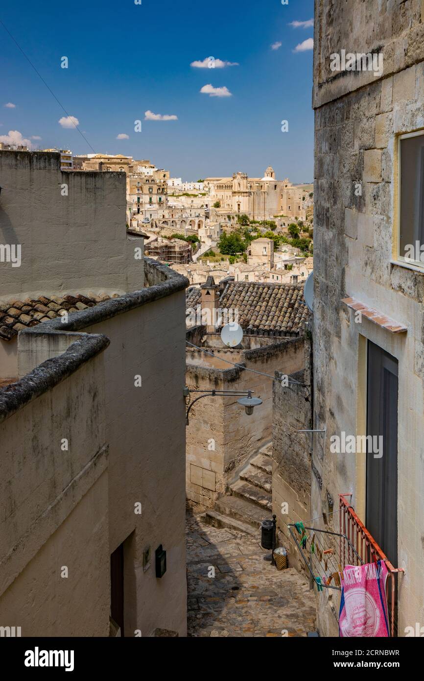 Matera, Basilicata, Italy - Panoramic view from the top of the Sassi of Matera, Barisano. The ancient houses of stone and brick, carved into the rock. Stock Photo