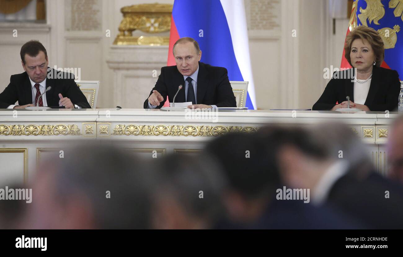(L-R) Russian Prime Minister Dmitry Medvedev, President Vladimir Putin and Chairwoman of the Russian Federation Council Valentina Matviyenko attend a meeting of the State Council on improving the general education system in the country at the Kremlin in Moscow, Russia, December 23, 2015. REUTERS/Maxim Shipenkov/Pool Stock Photo