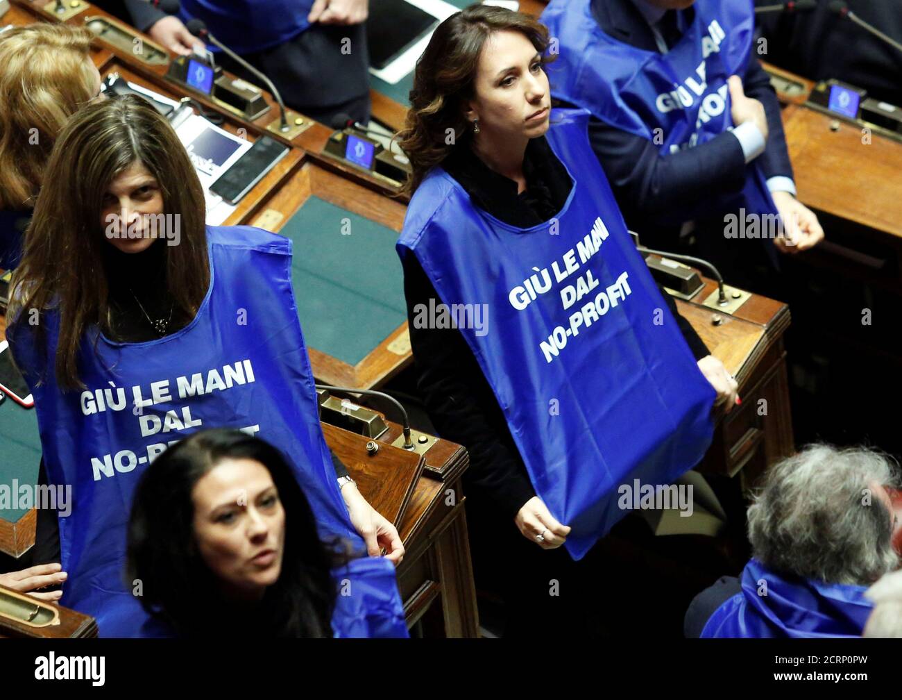 Members of Forza Italia party demonstrate during a final vote on Italy's 2019 budget law at the Lower House of the Parliament in Rome, Italy, December 29, 2018. Shirts read: 'Hands off from non-profit organisations'. REUTERS/Remo Casilli Stock Photo
