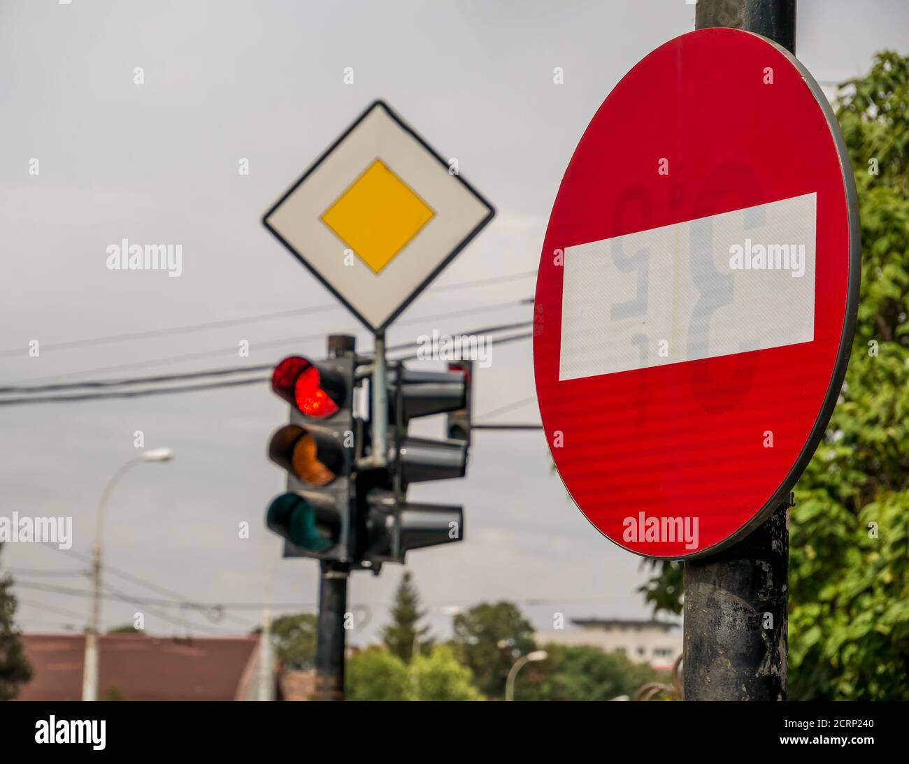 No entry traffic sign and stop lights in the background Stock Photo Alamy